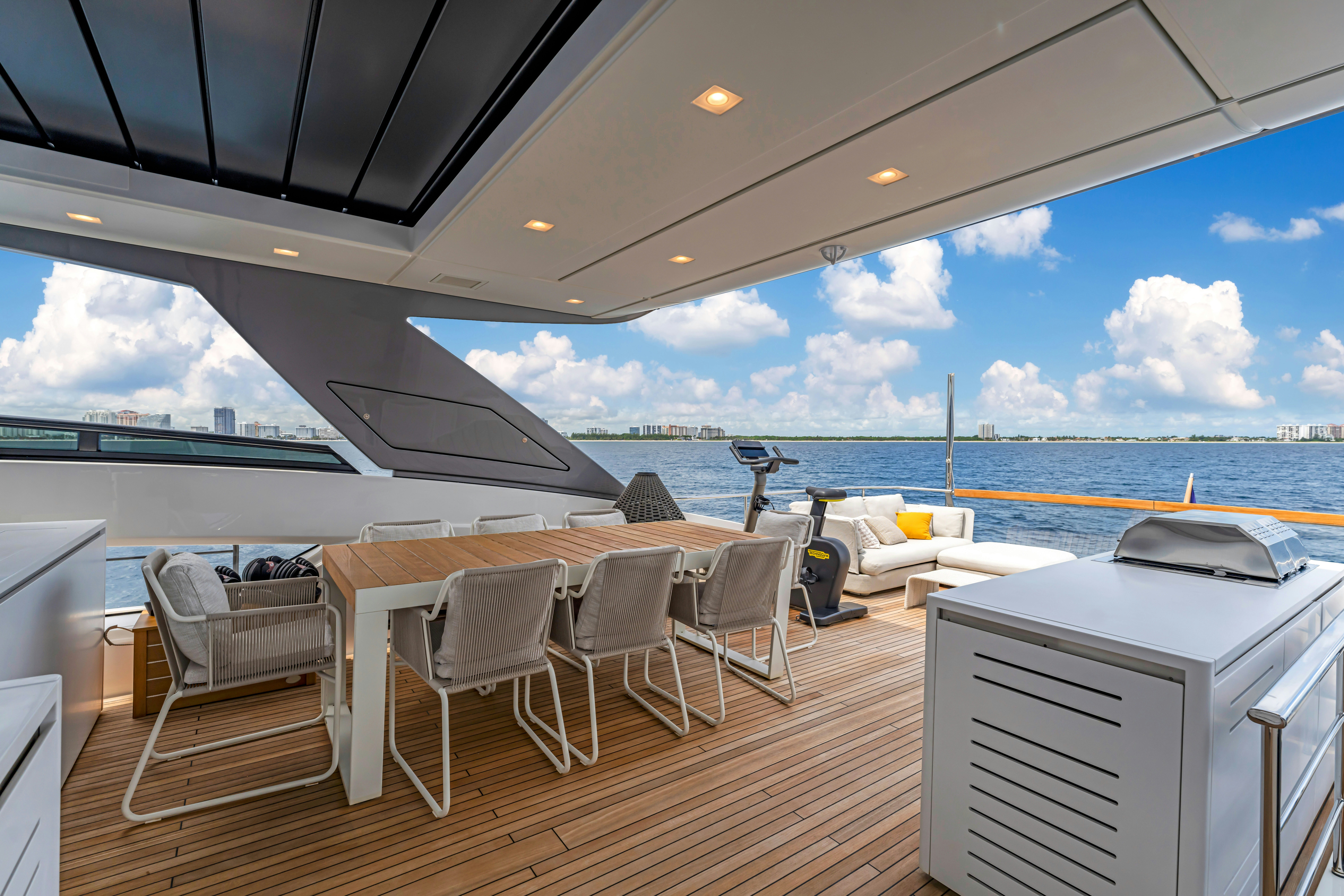 a deck with a view of the ocean and the ocean aboard NOTYNOG Yacht for Charter