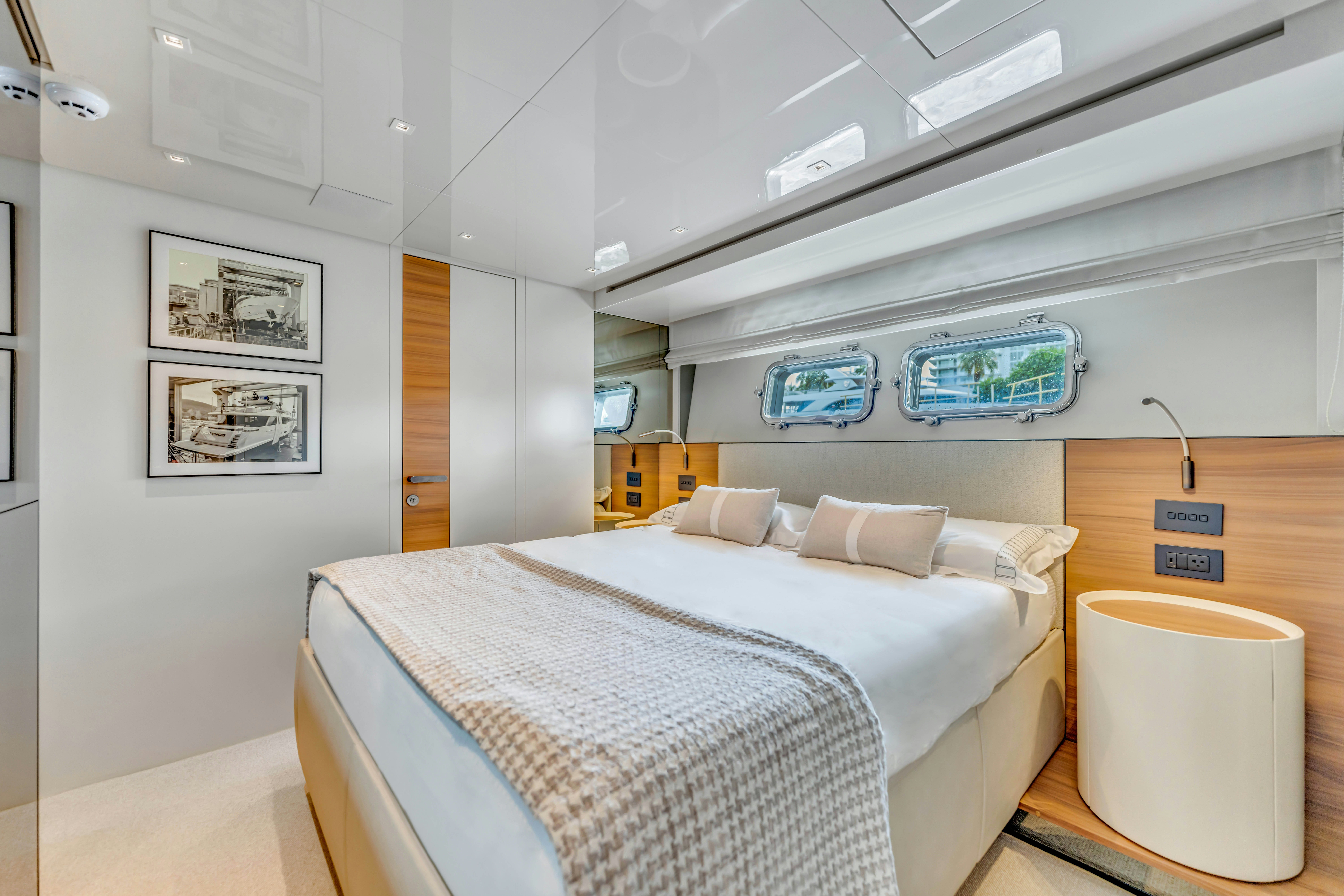 a bed in a room aboard NOTYNOG Yacht for Charter