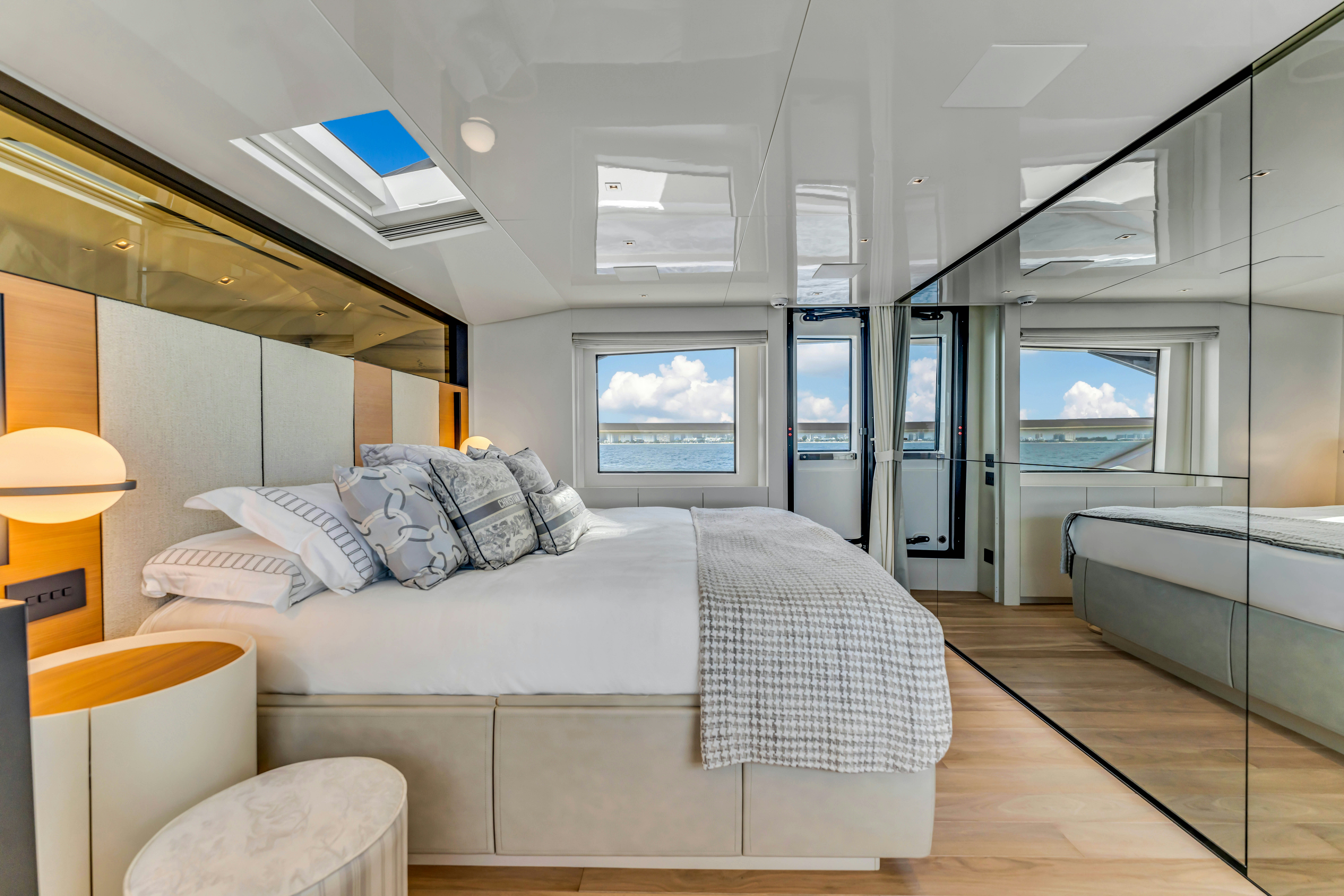 a room with a bed and a tv aboard NOTYNOG Yacht for Charter