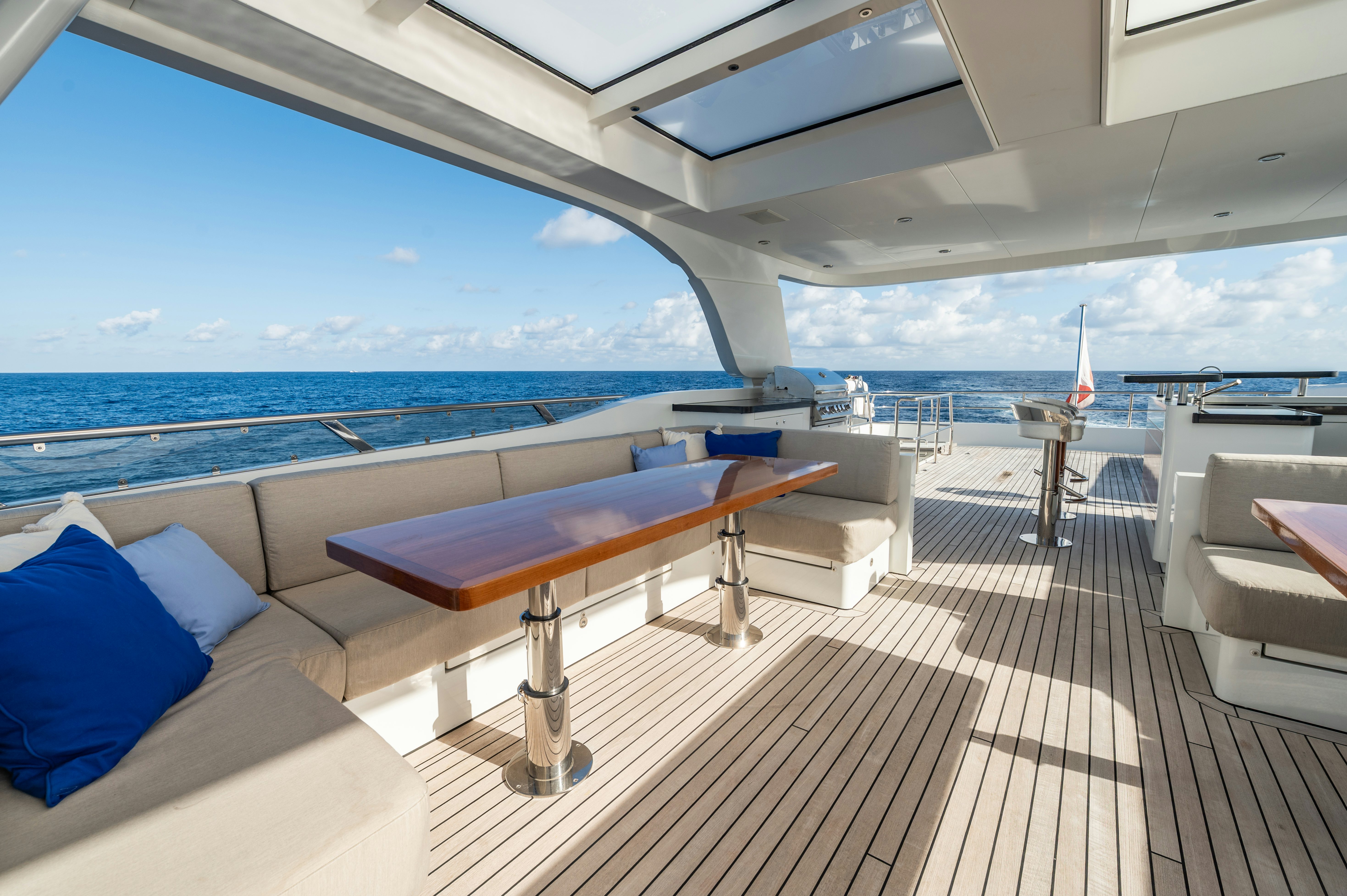 a deck with a view of the ocean and the deck aboard FIREFLY Yacht for Sale