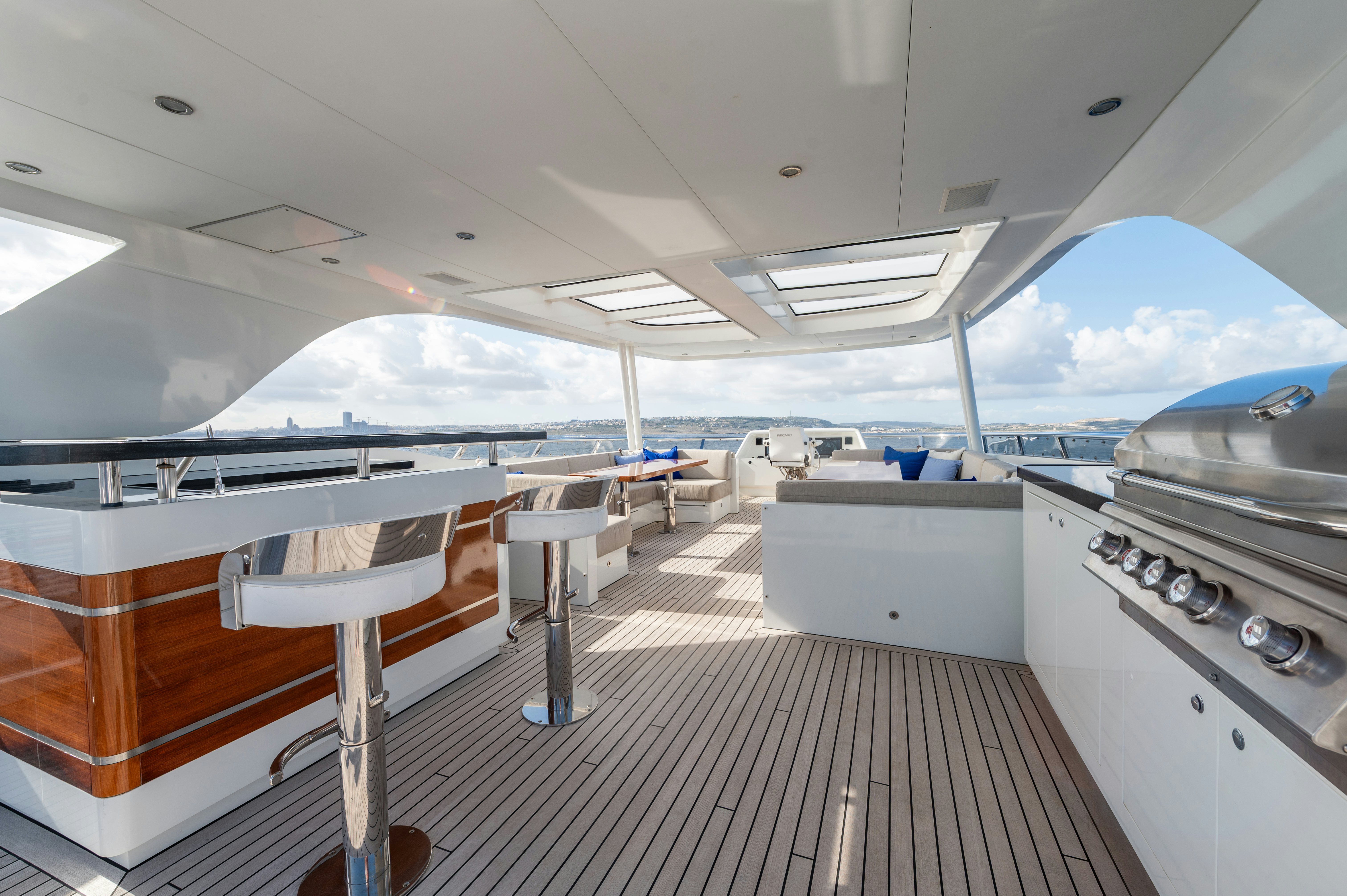 a kitchen with a large glass window aboard FIREFLY Yacht for Sale