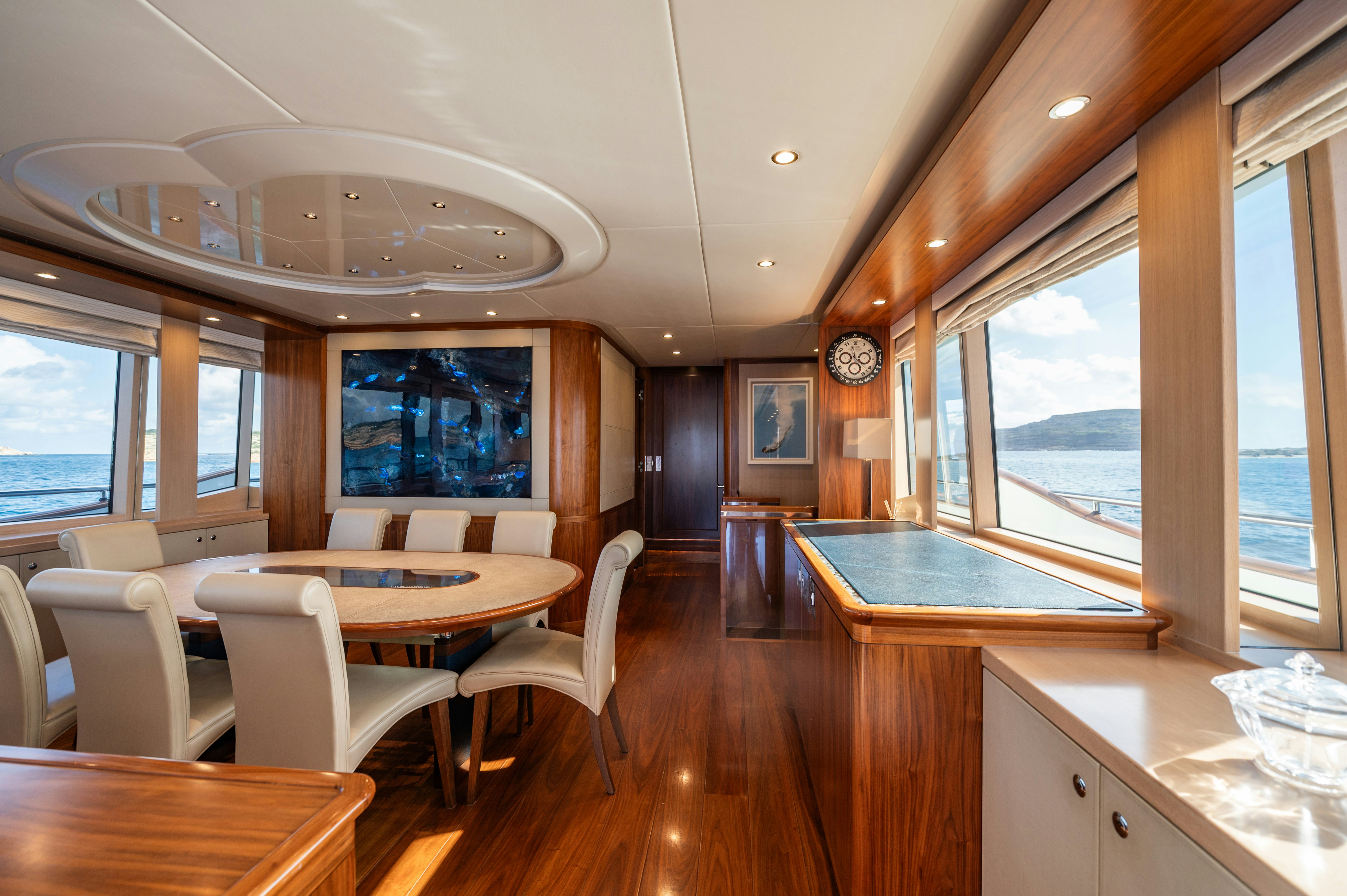 a large kitchen with a large window aboard FIREFLY Yacht for Sale