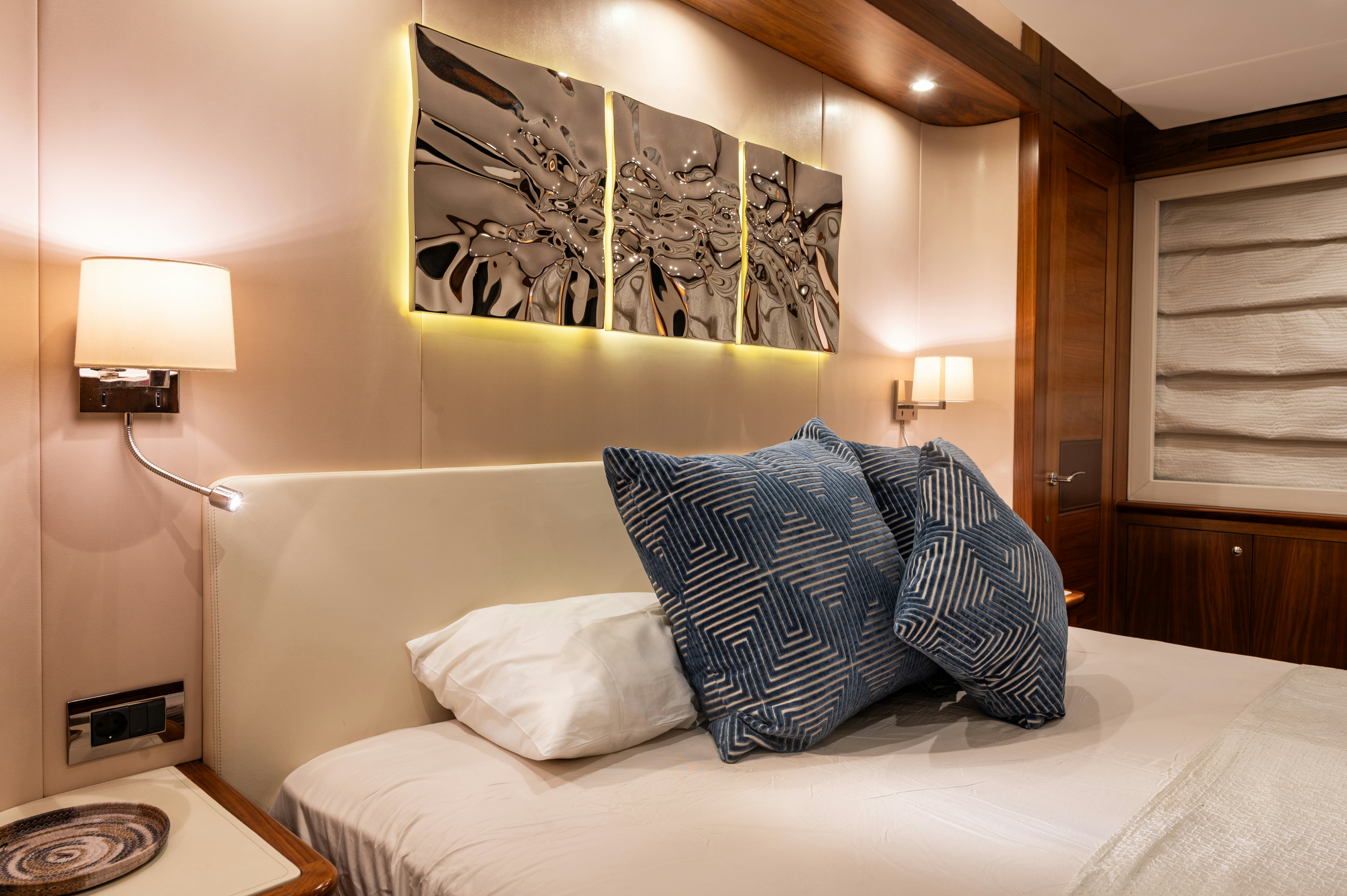 a bed with pillows aboard FIREFLY Yacht for Sale