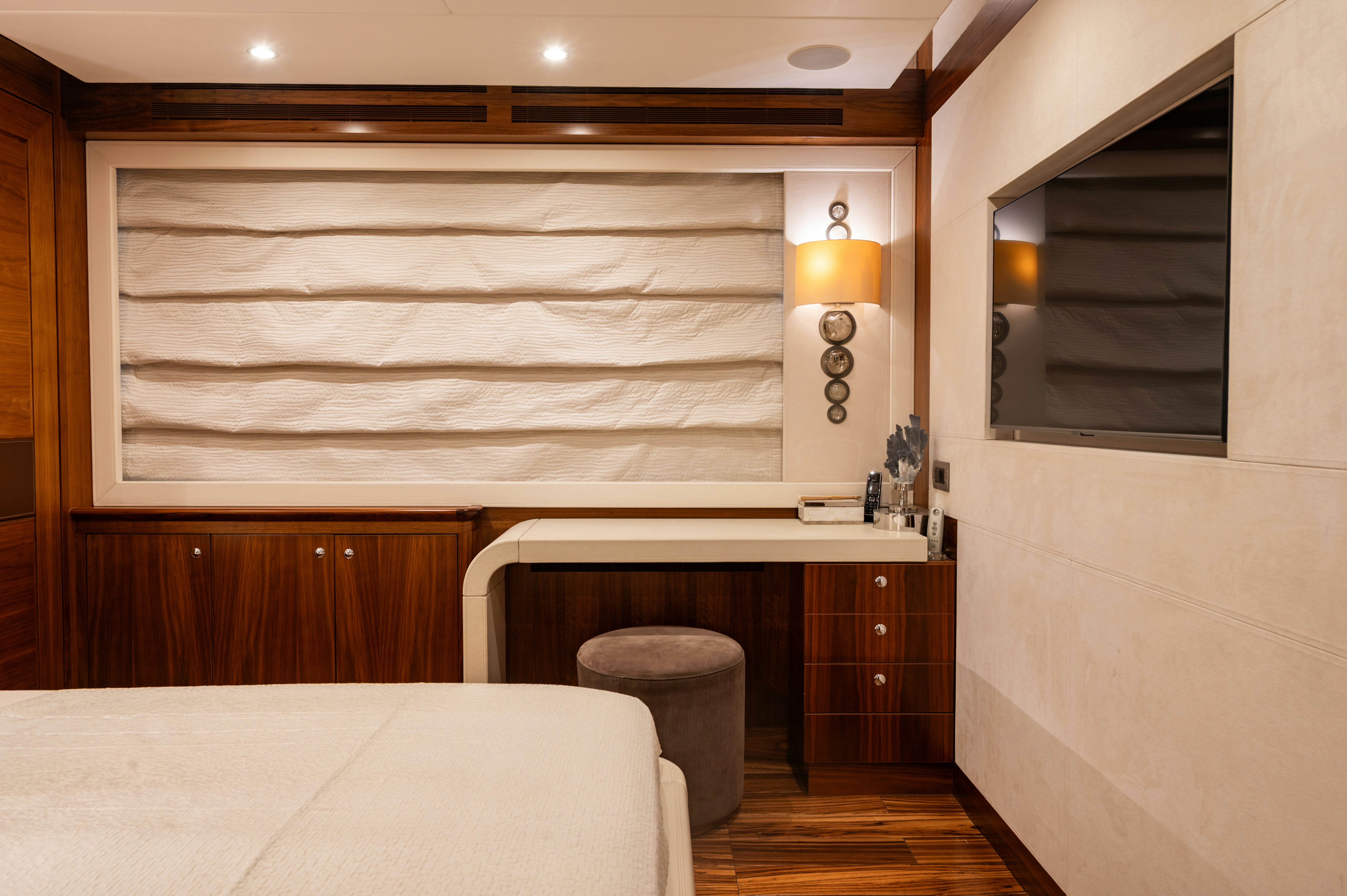 a bathroom with a large mirror aboard FIREFLY Yacht for Sale