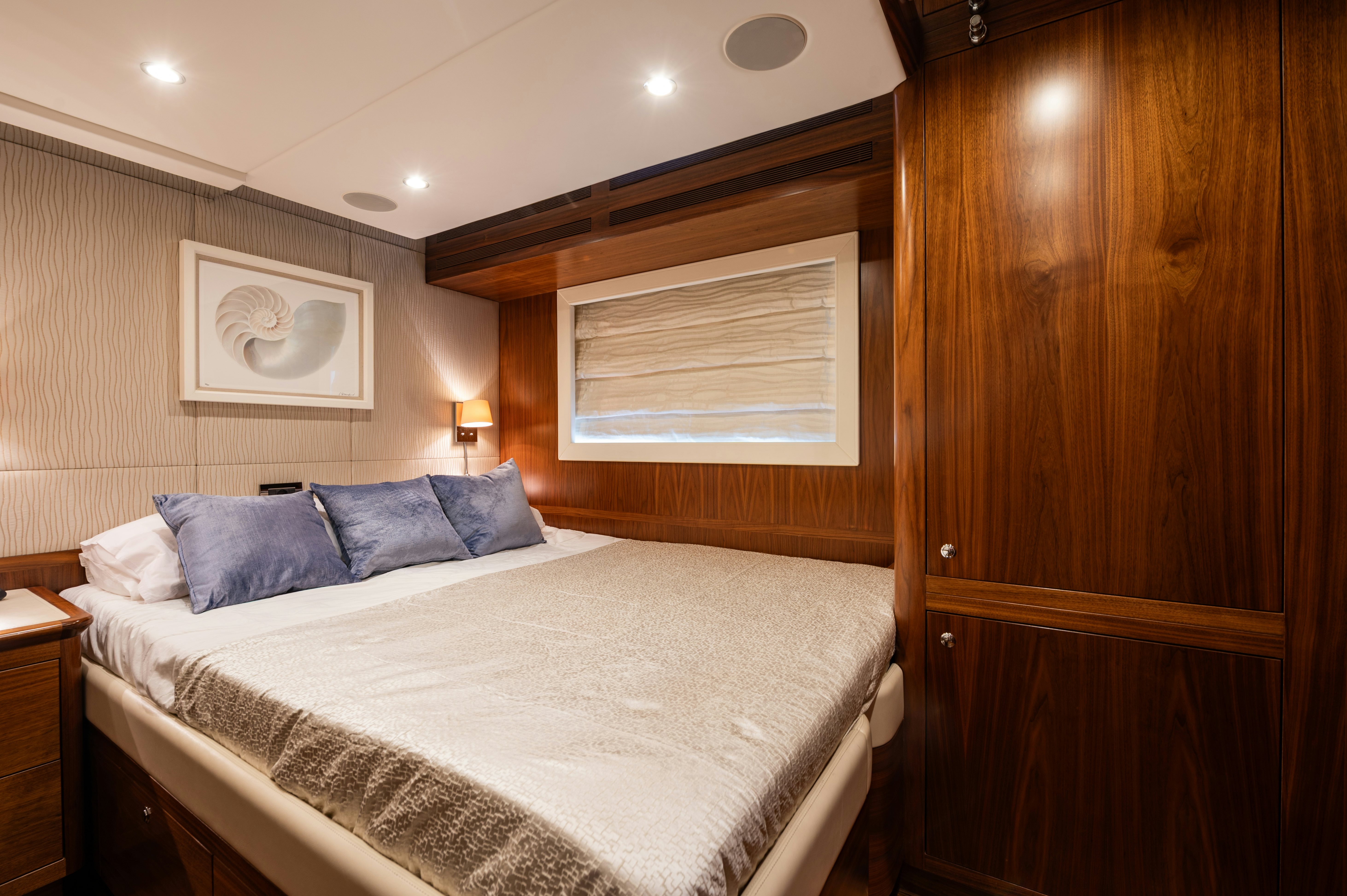 a bed in a room aboard FIREFLY Yacht for Sale