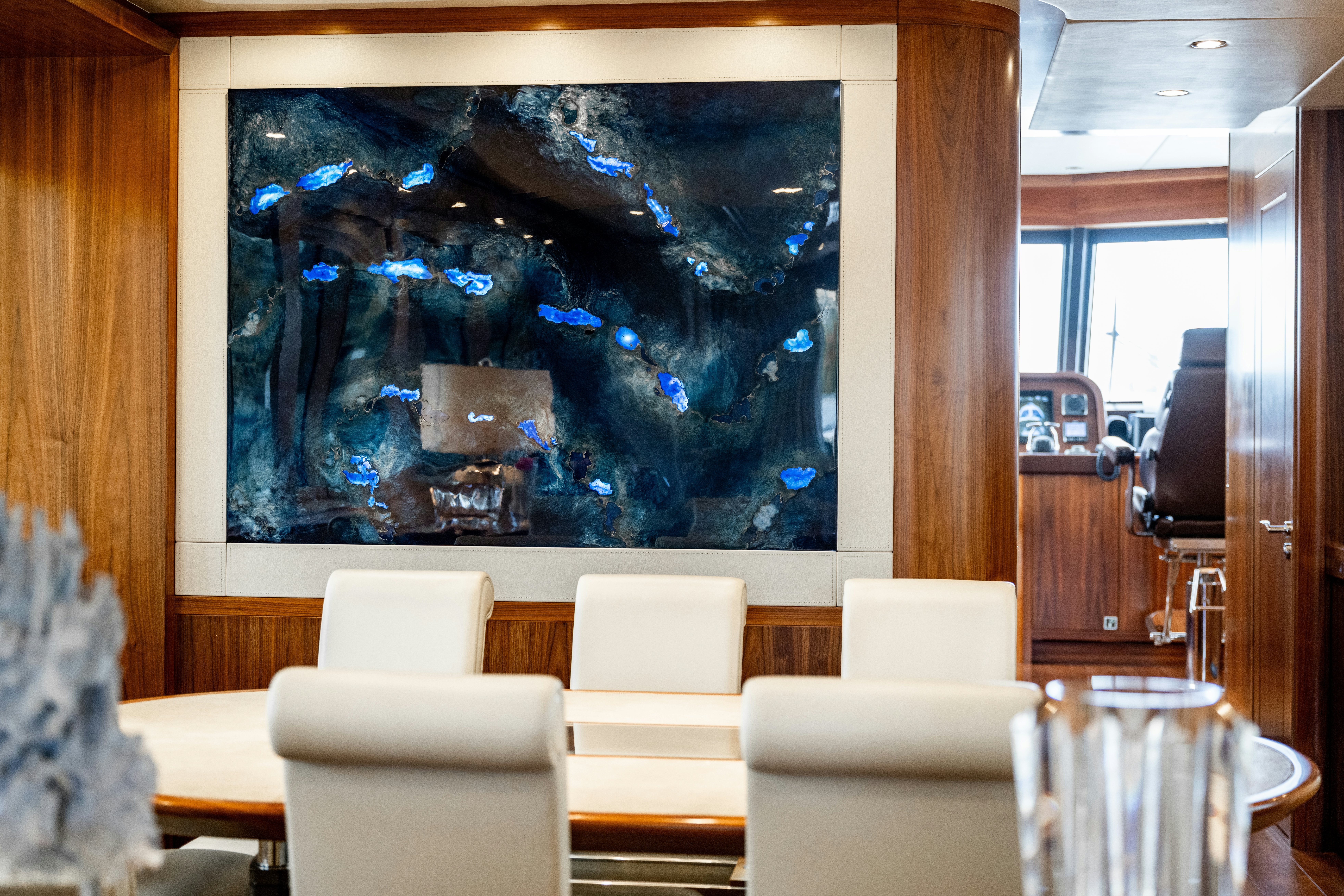 a room with a large aquarium aboard FIREFLY Yacht for Sale