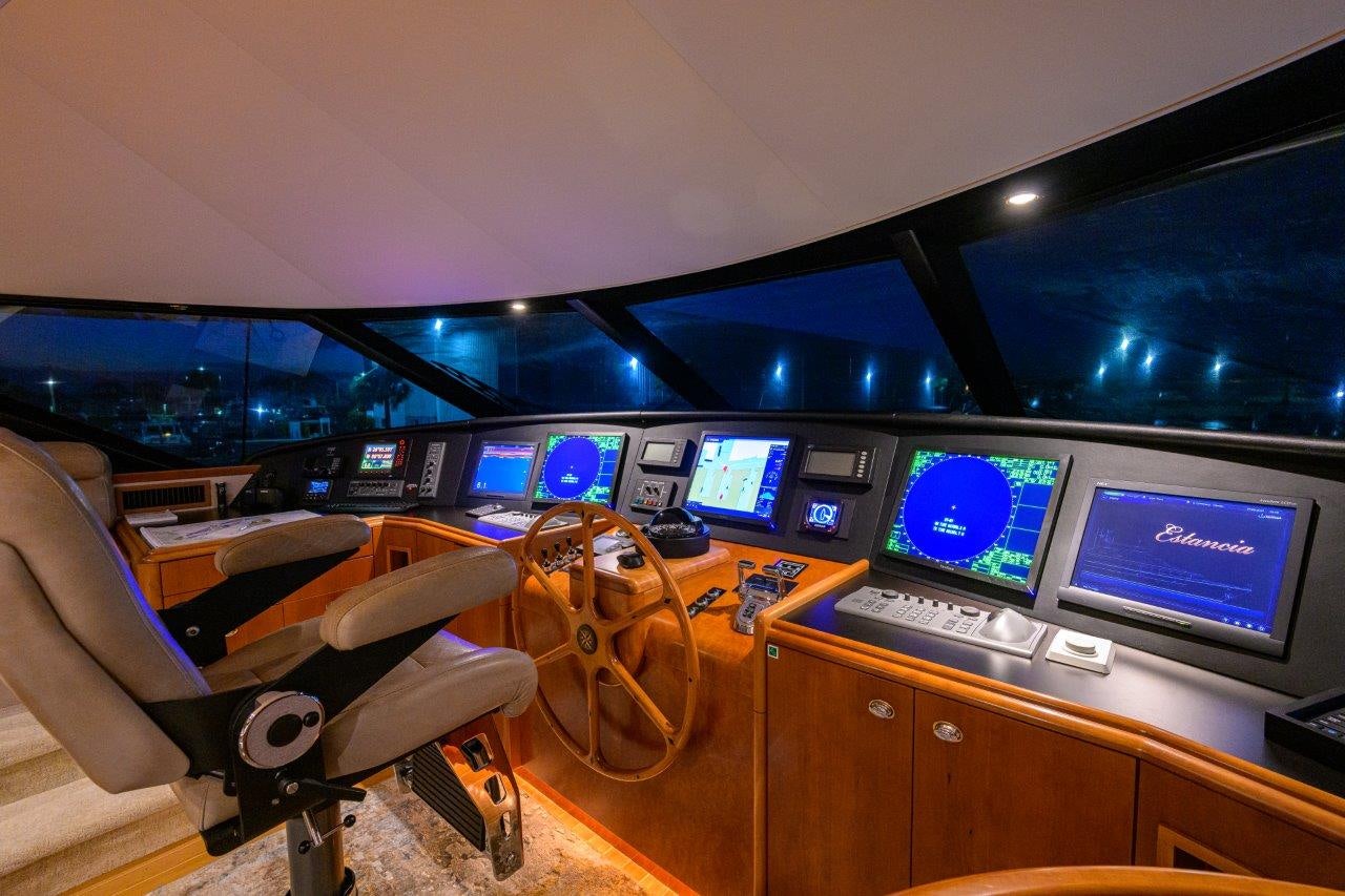 a room with many monitors and screens aboard EXODUS Yacht for Sale