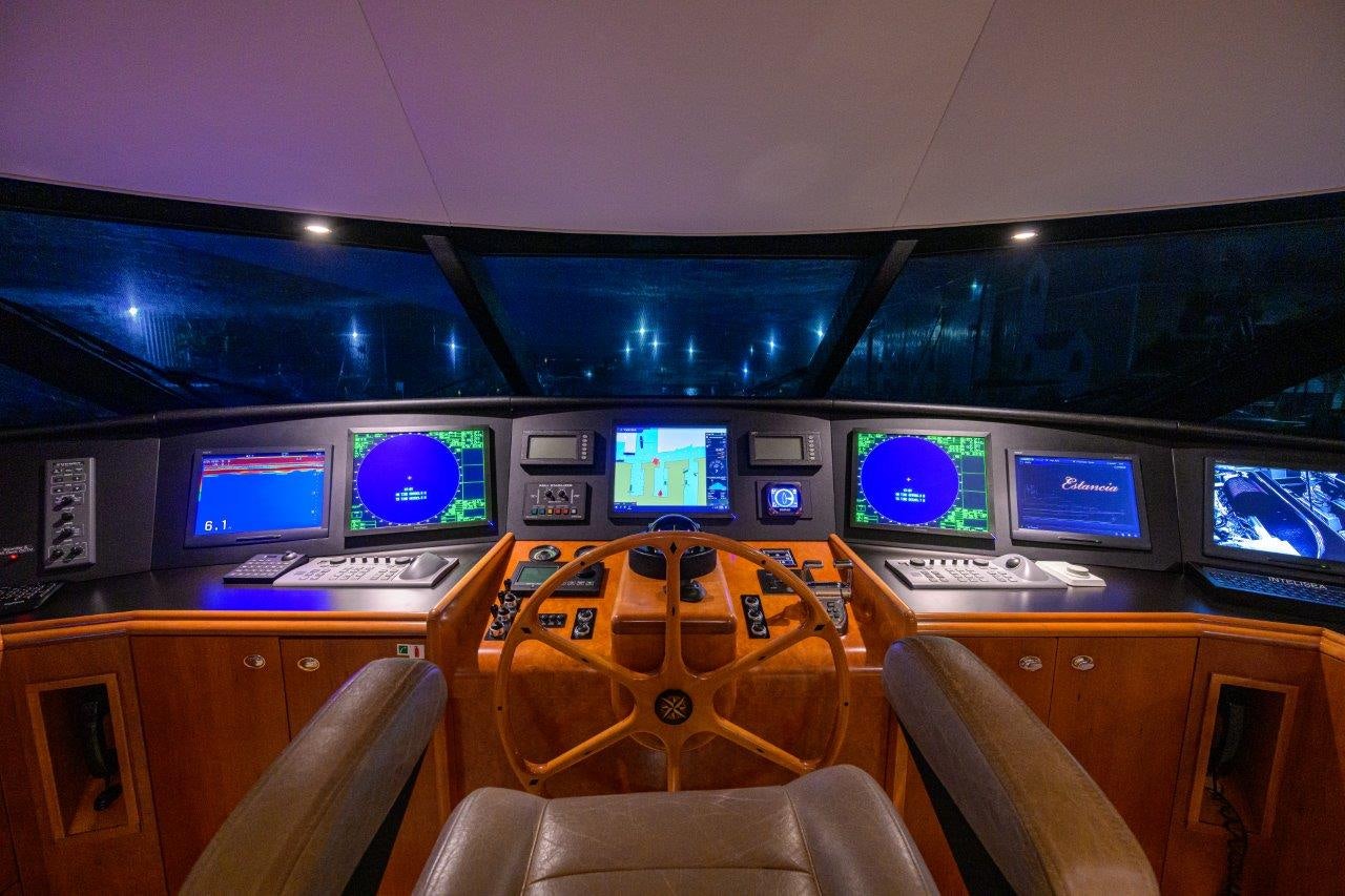 a room with many screens aboard EXODUS Yacht for Sale