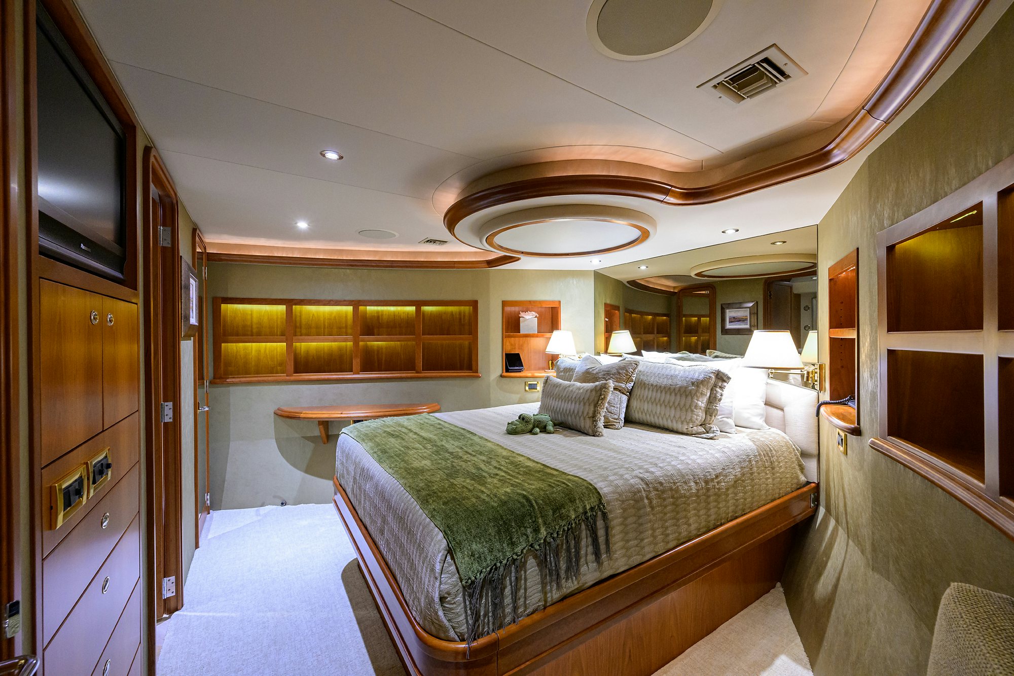 a hotel room with a bed aboard EXODUS Yacht for Sale