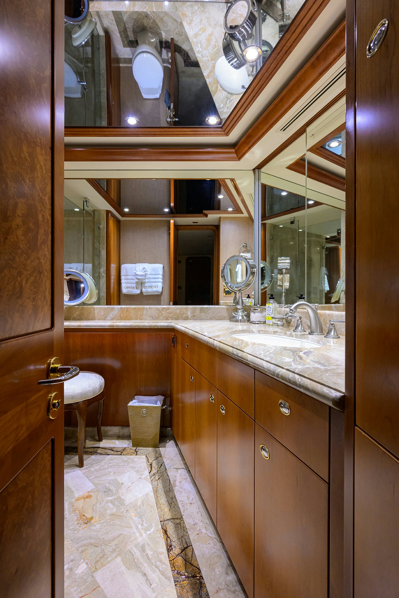 a bathroom with a sink and a mirror aboard EXODUS Yacht for Sale