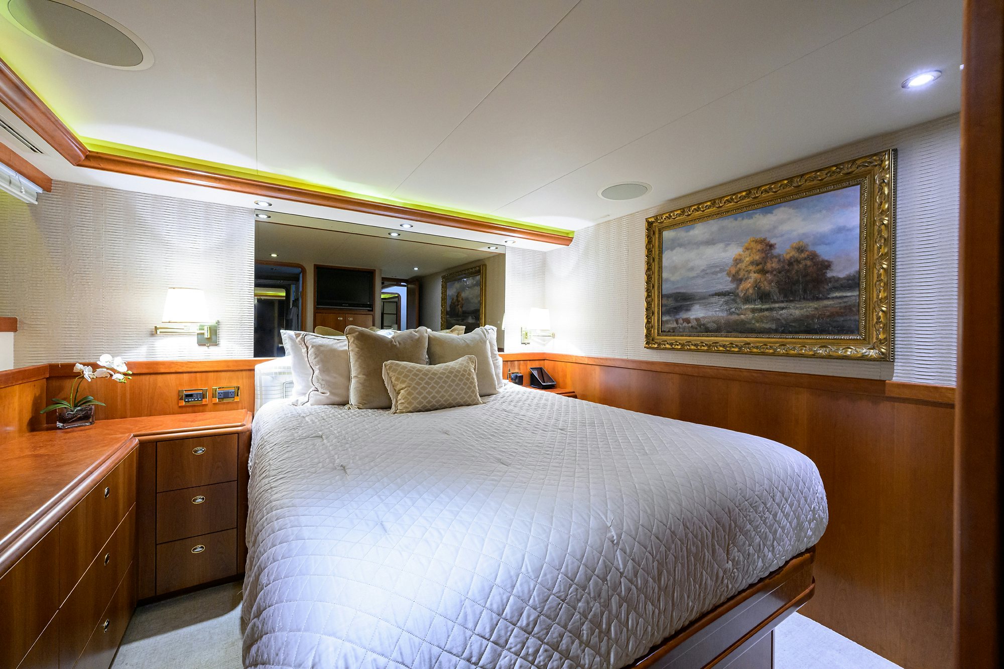 a bedroom with a large bed aboard EXODUS Yacht for Sale