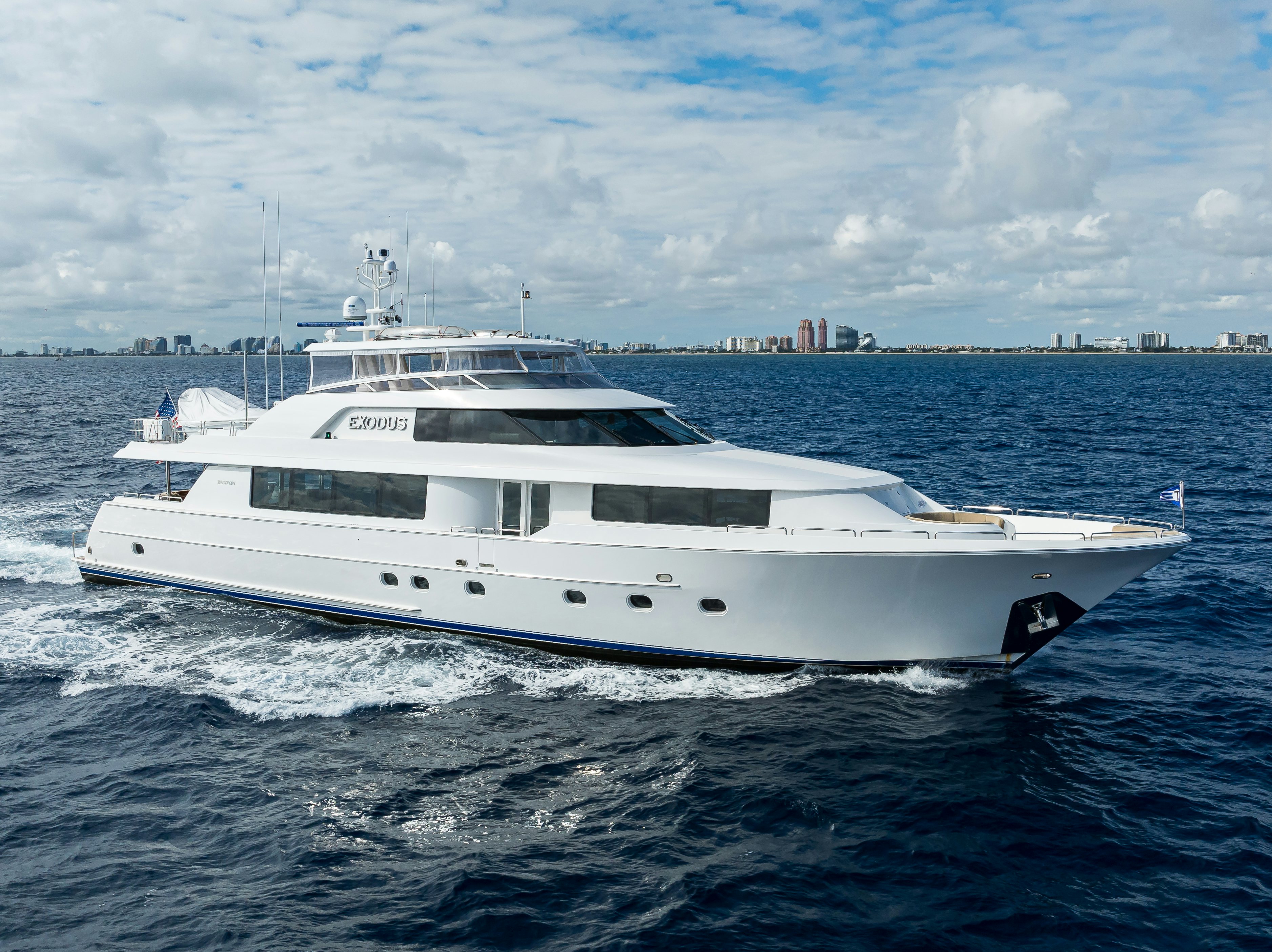 a white yacht on the water aboard EXODUS Yacht for Sale