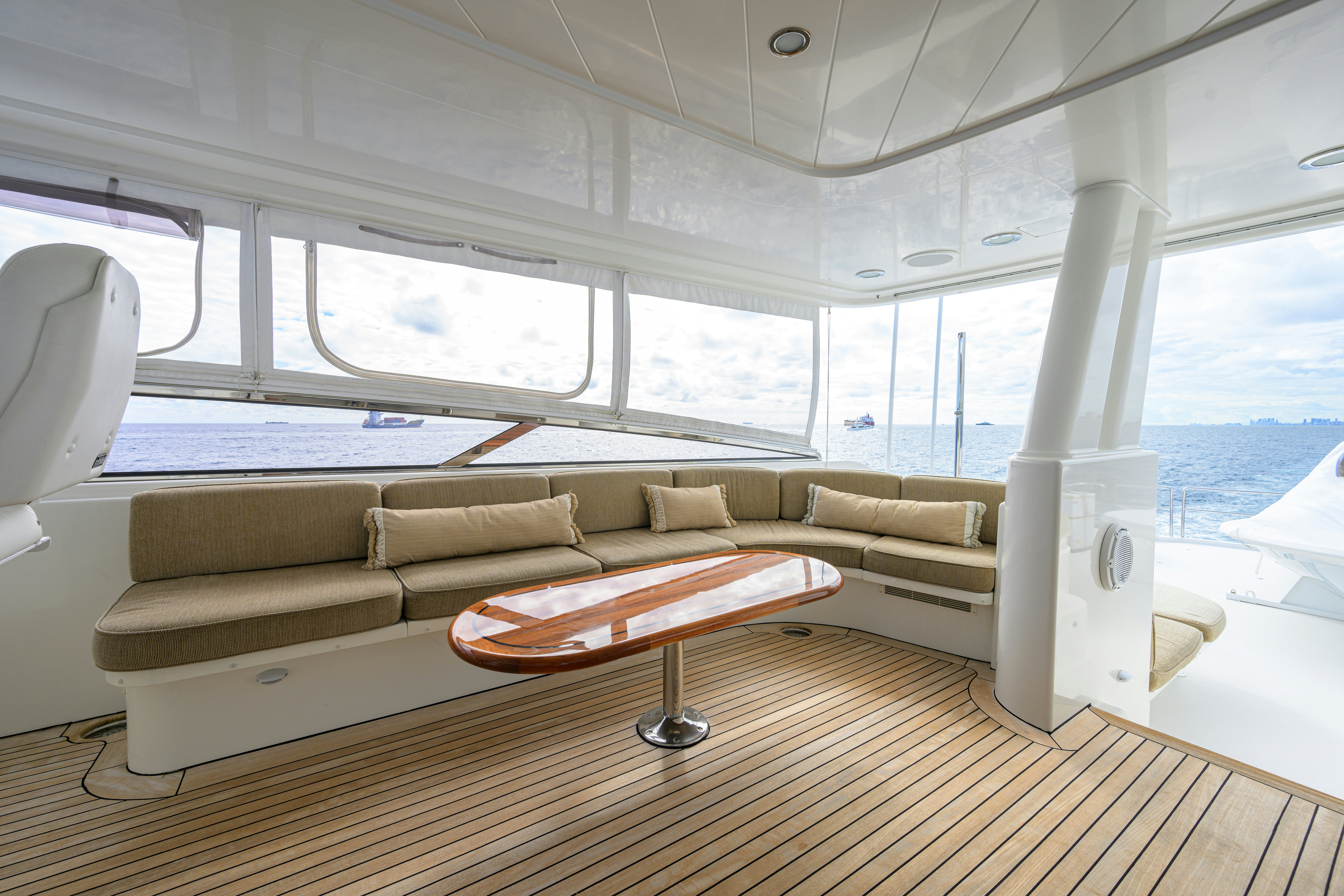 a couch in a room aboard EXODUS Yacht for Sale