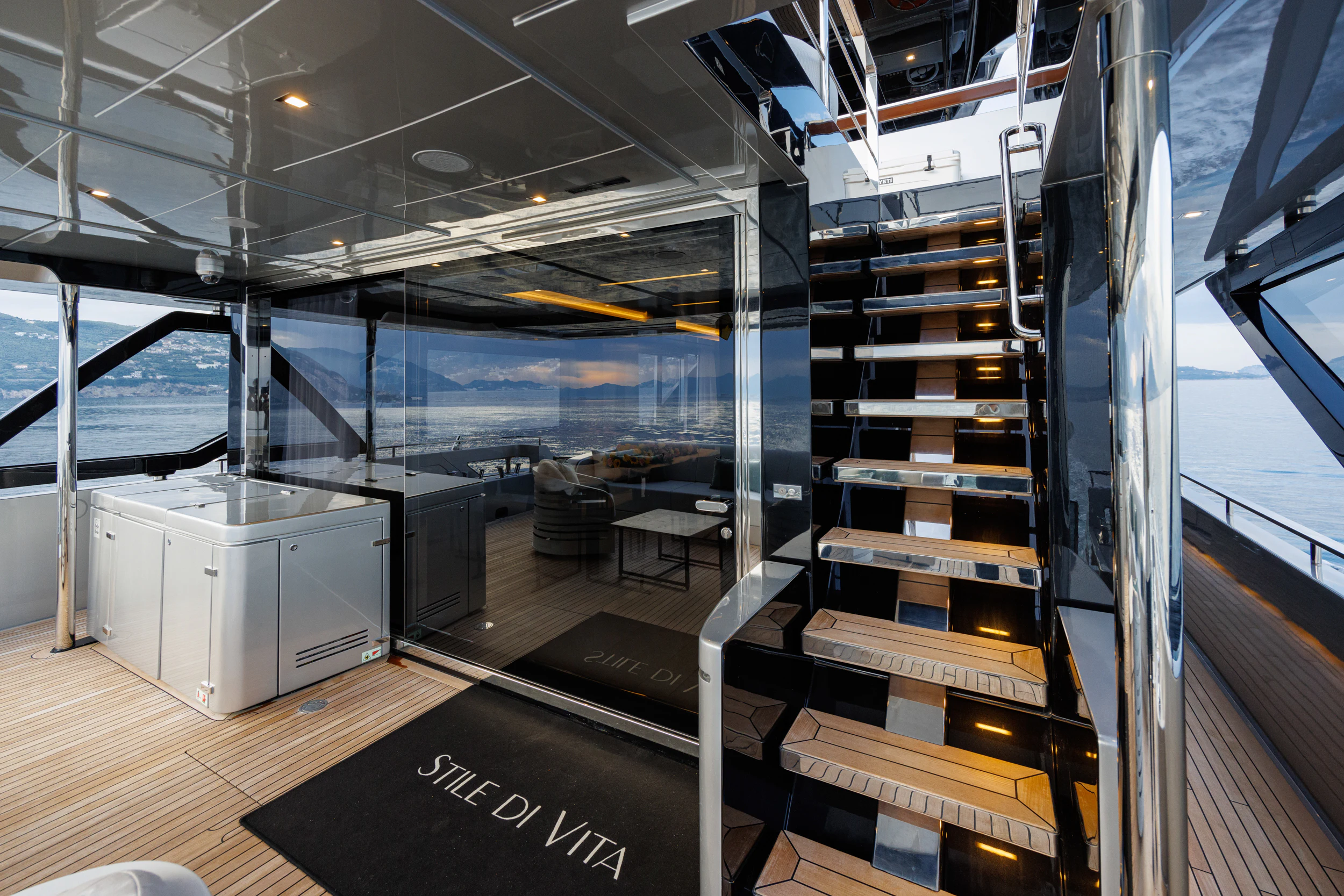 a large room with a large glass wall and a large glass window aboard STILE DI VITA Yacht for Charter