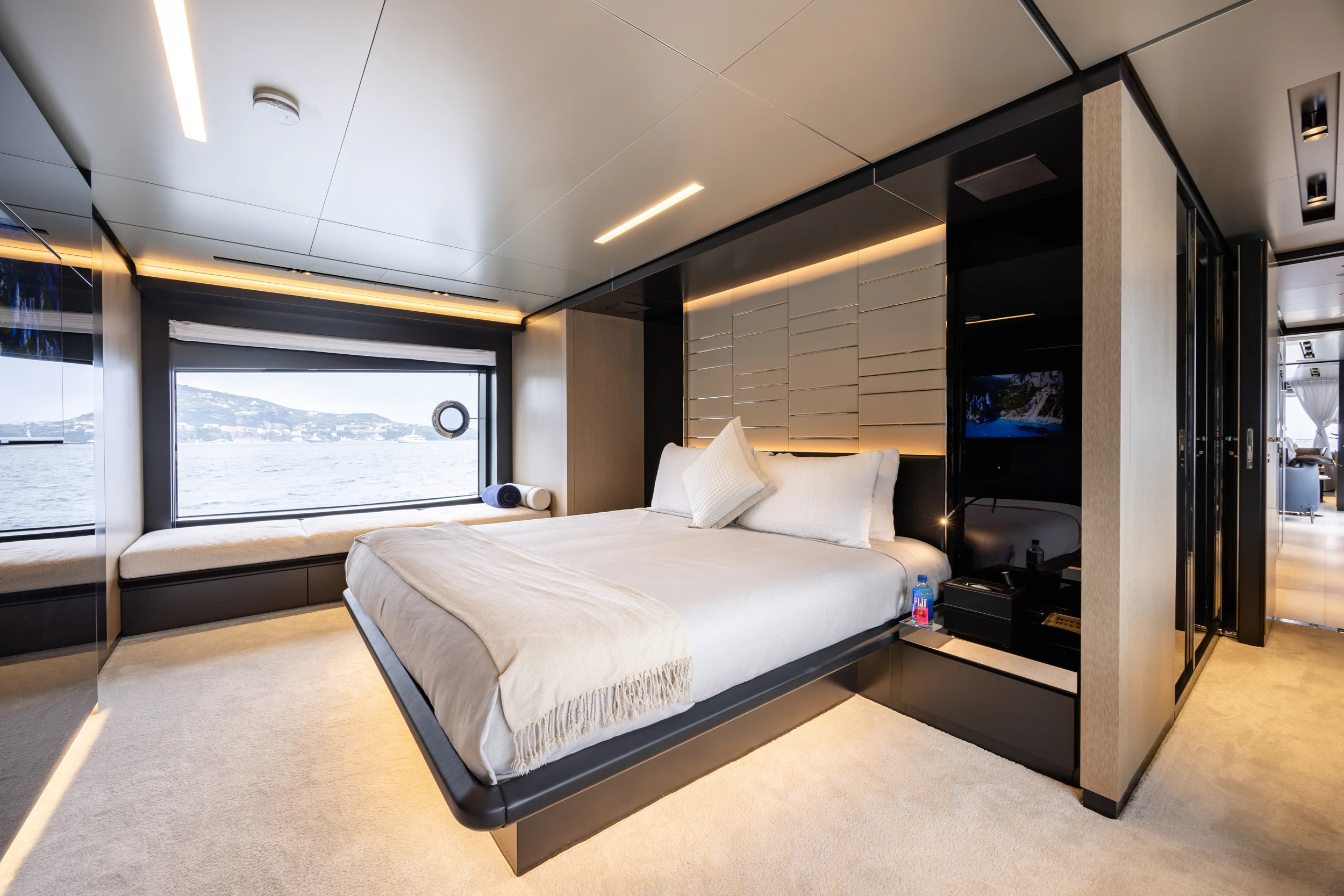 a large bedroom with a large bed aboard STILE DI VITA Yacht for Charter