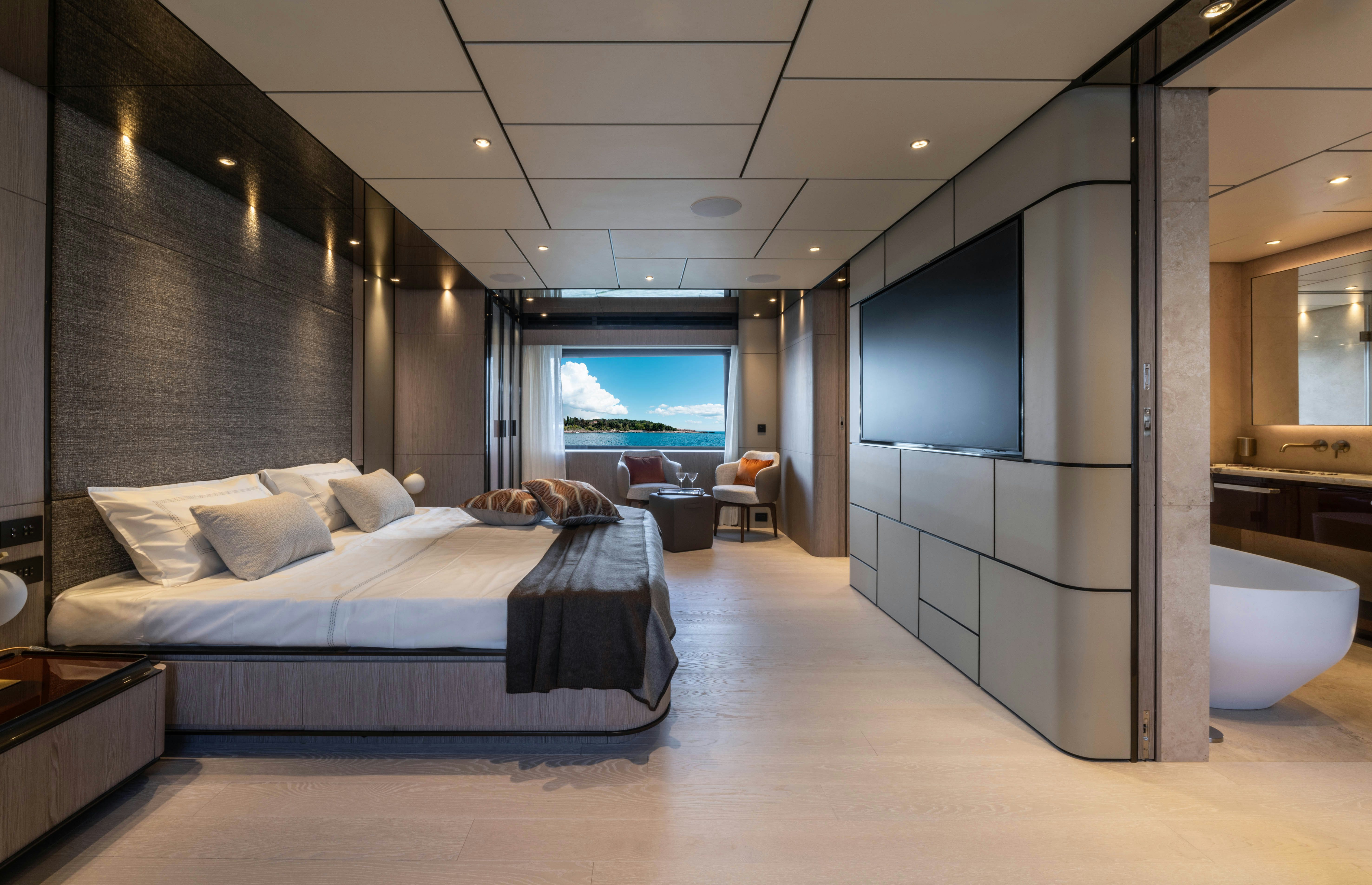 a large bedroom with a large bed aboard CANOE CANOE Yacht for Charter