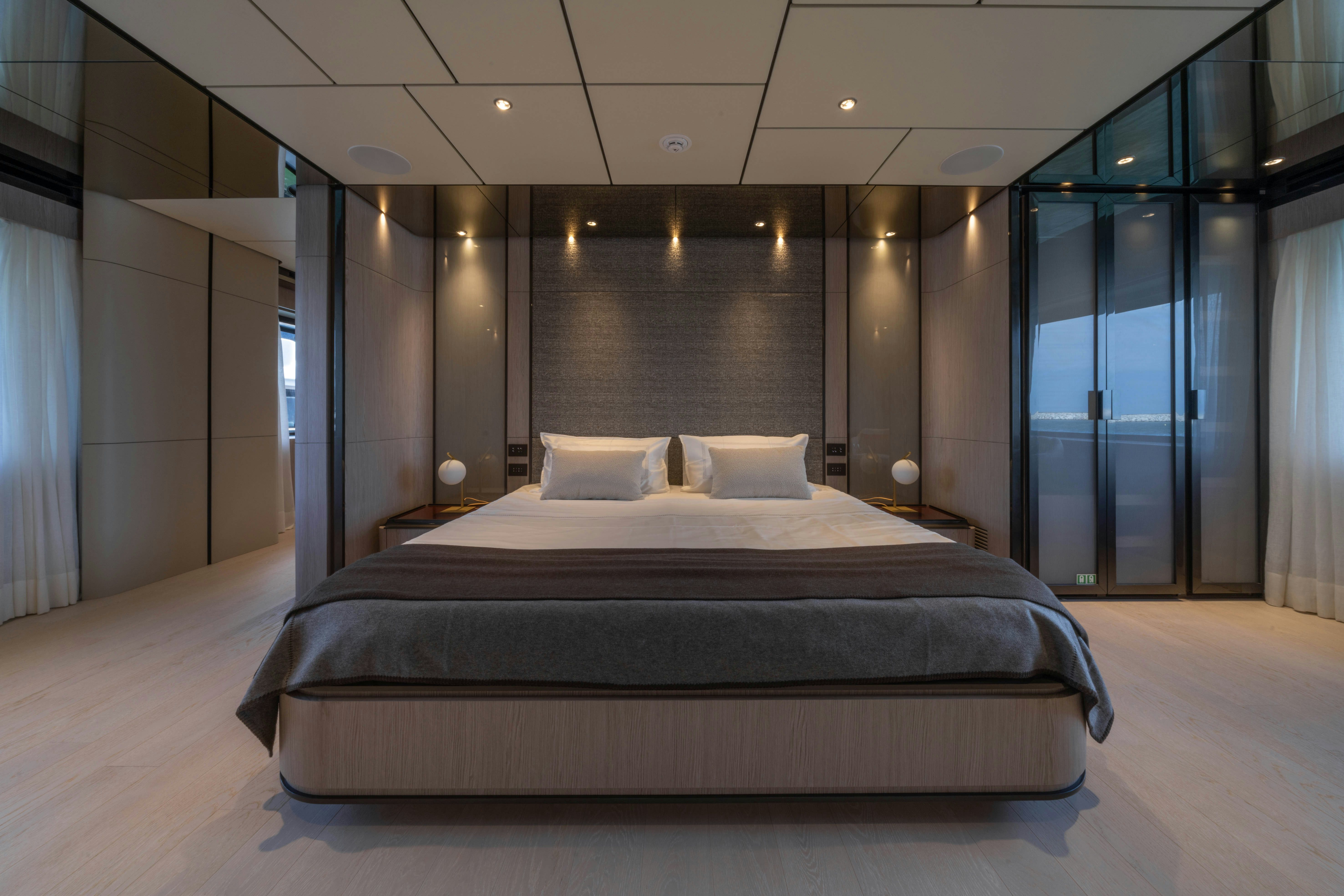 a large bed in a room aboard CANOE CANOE Yacht for Charter