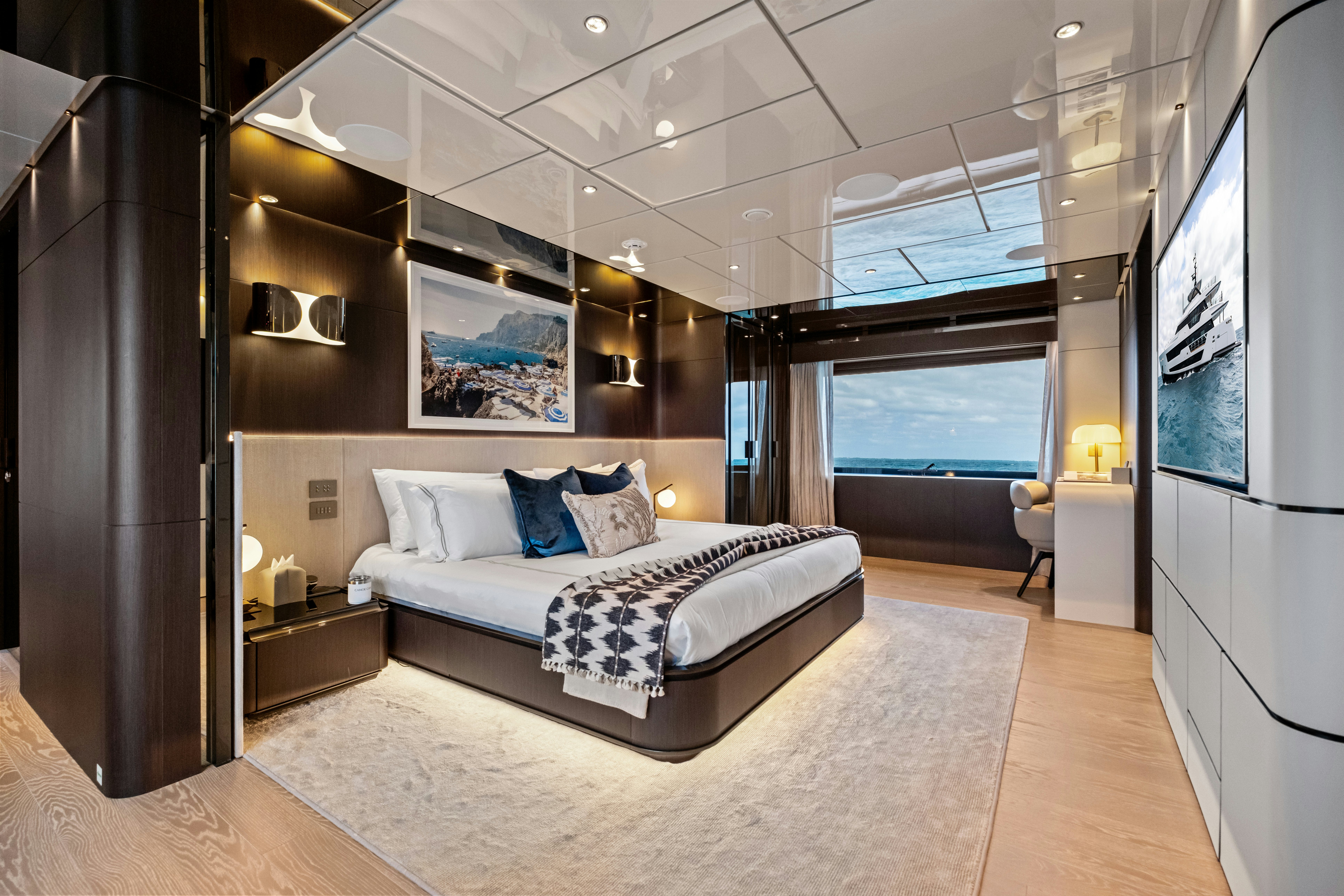 a bedroom with a large bed aboard CANOE CANOE Yacht for Charter