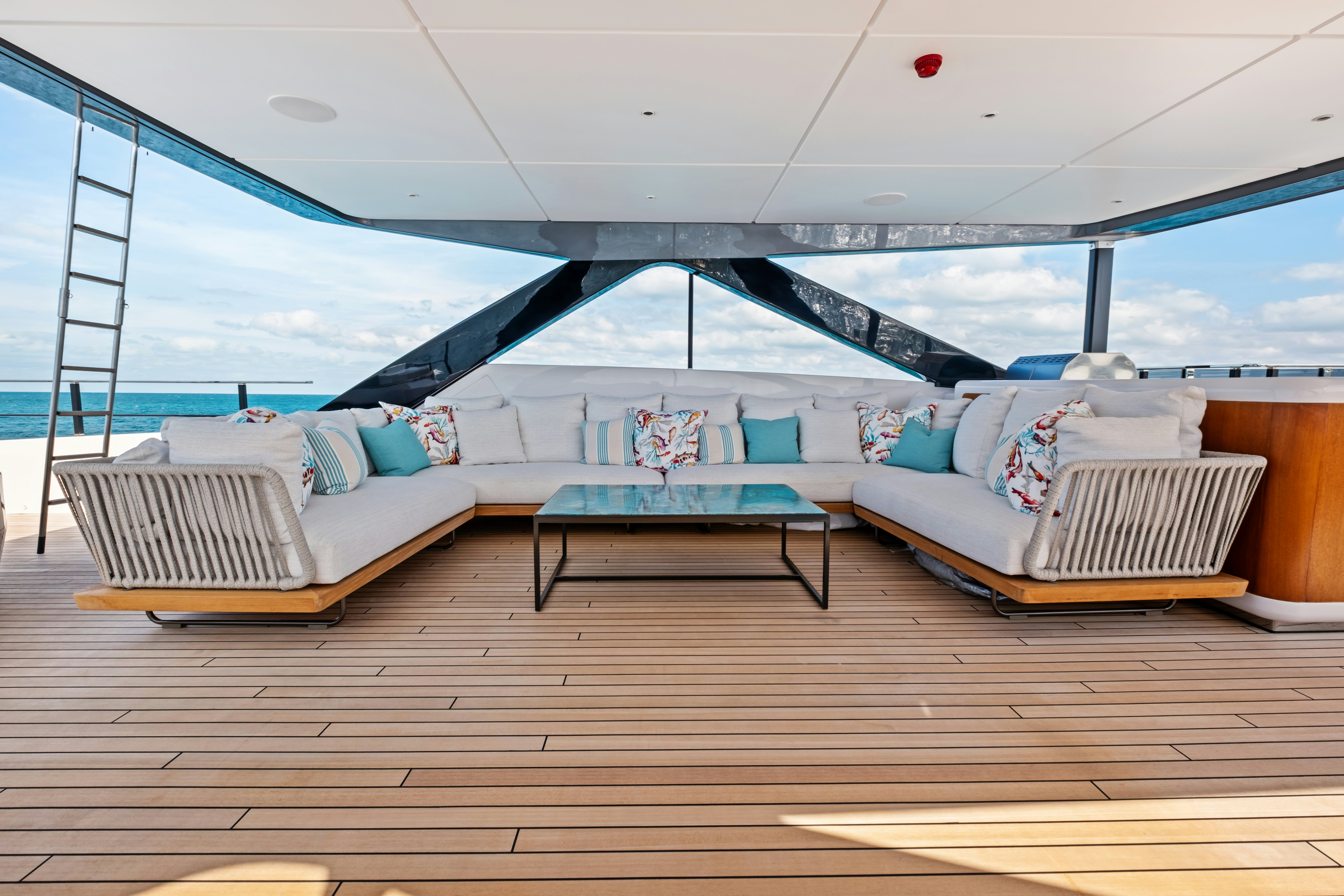 a room with a couch and a table aboard CANOE CANOE Yacht for Charter