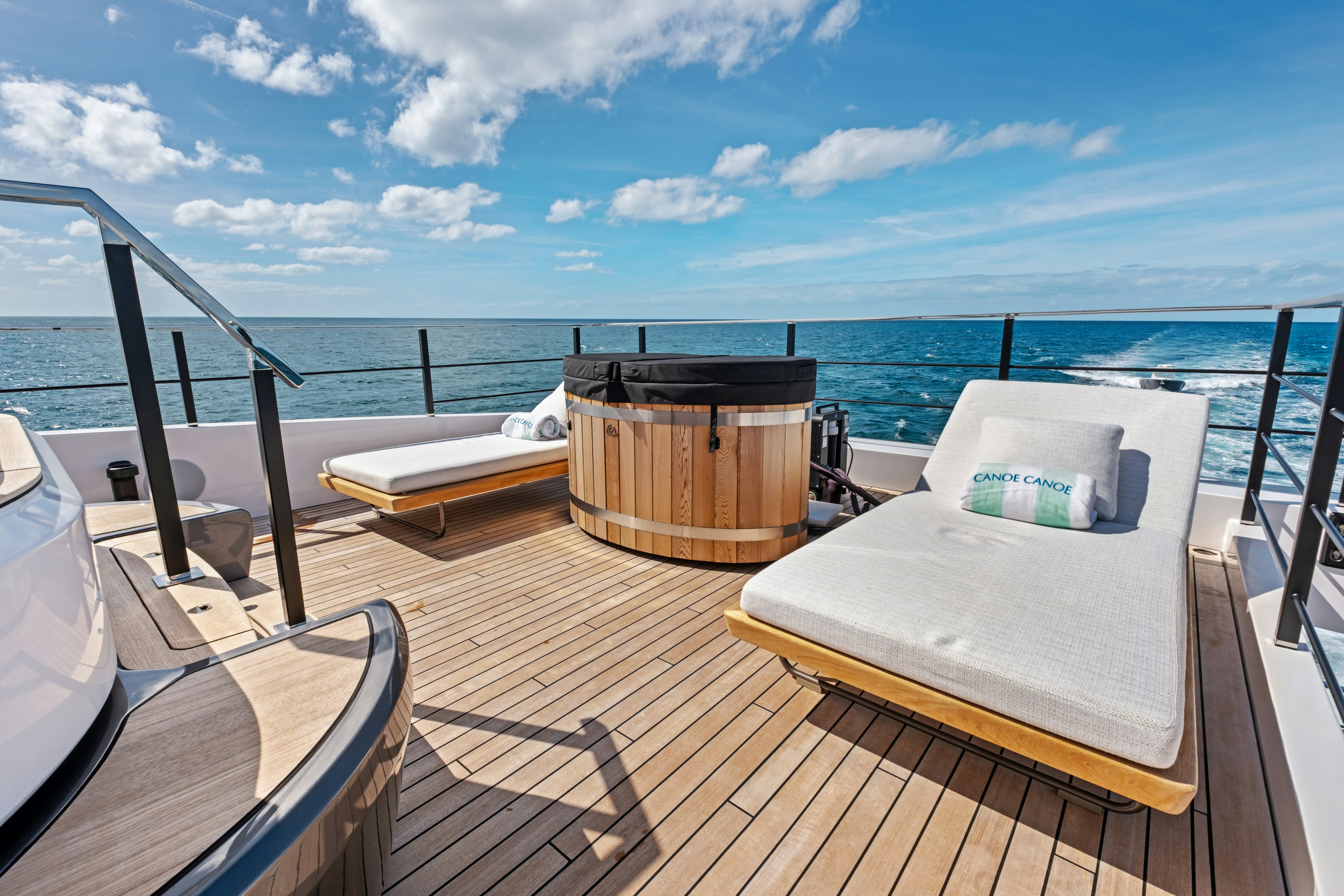 a boat on a deck aboard CANOE CANOE Yacht for Charter
