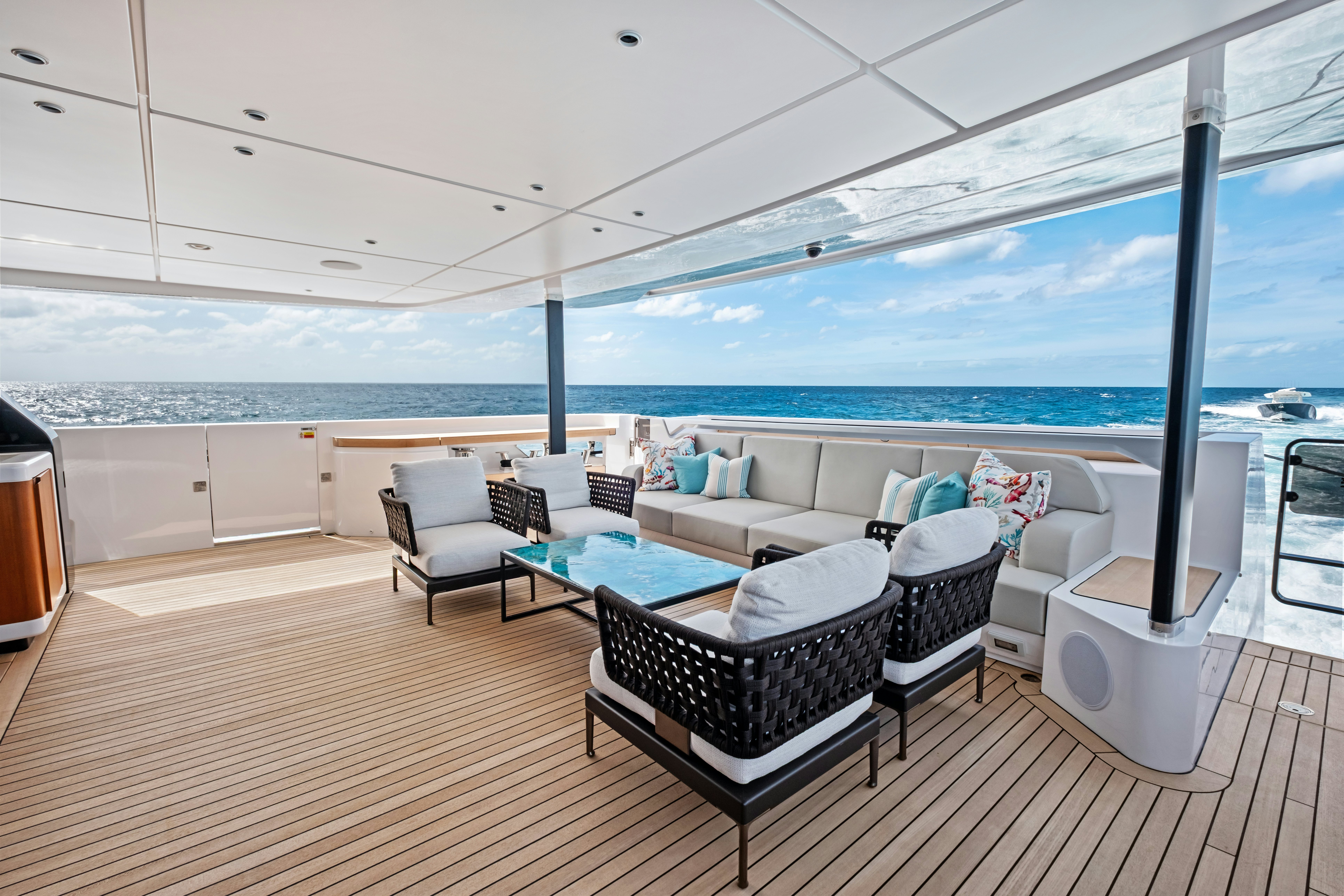 a room with a couch and a table and chairs aboard CANOE CANOE Yacht for Charter