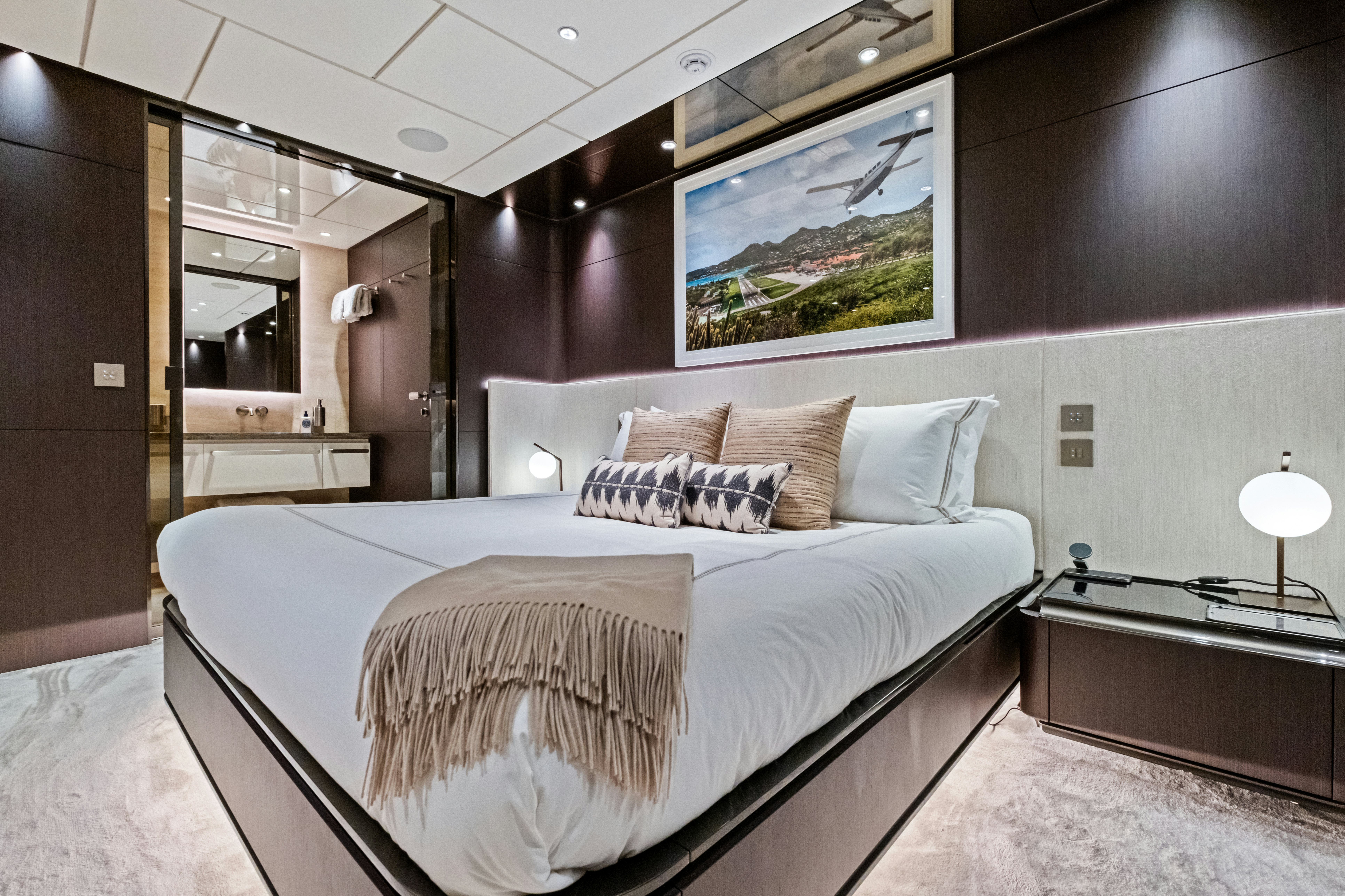 a bed in a room aboard CANOE CANOE Yacht for Charter