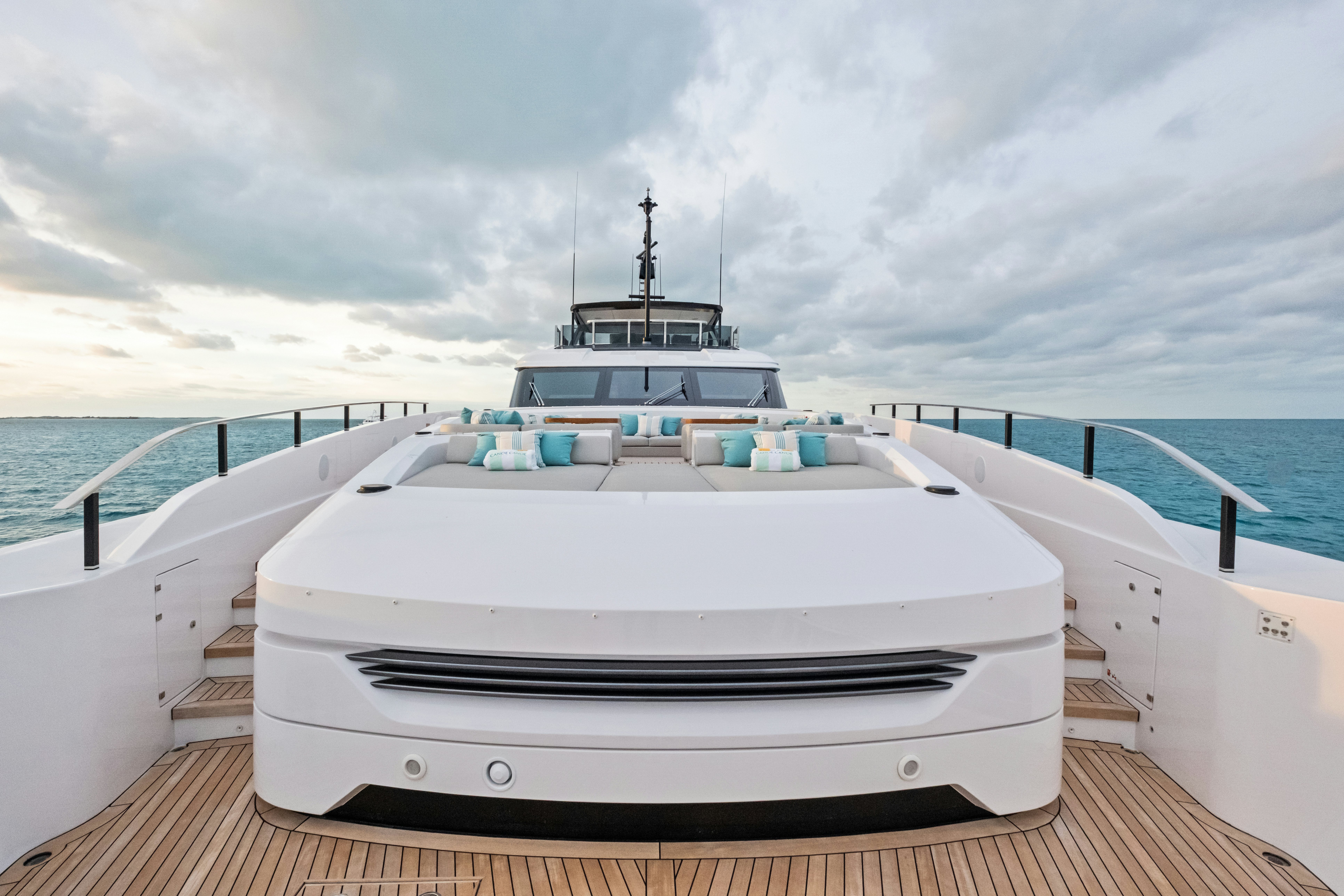 a white boat on a deck aboard CANOE CANOE Yacht for Charter