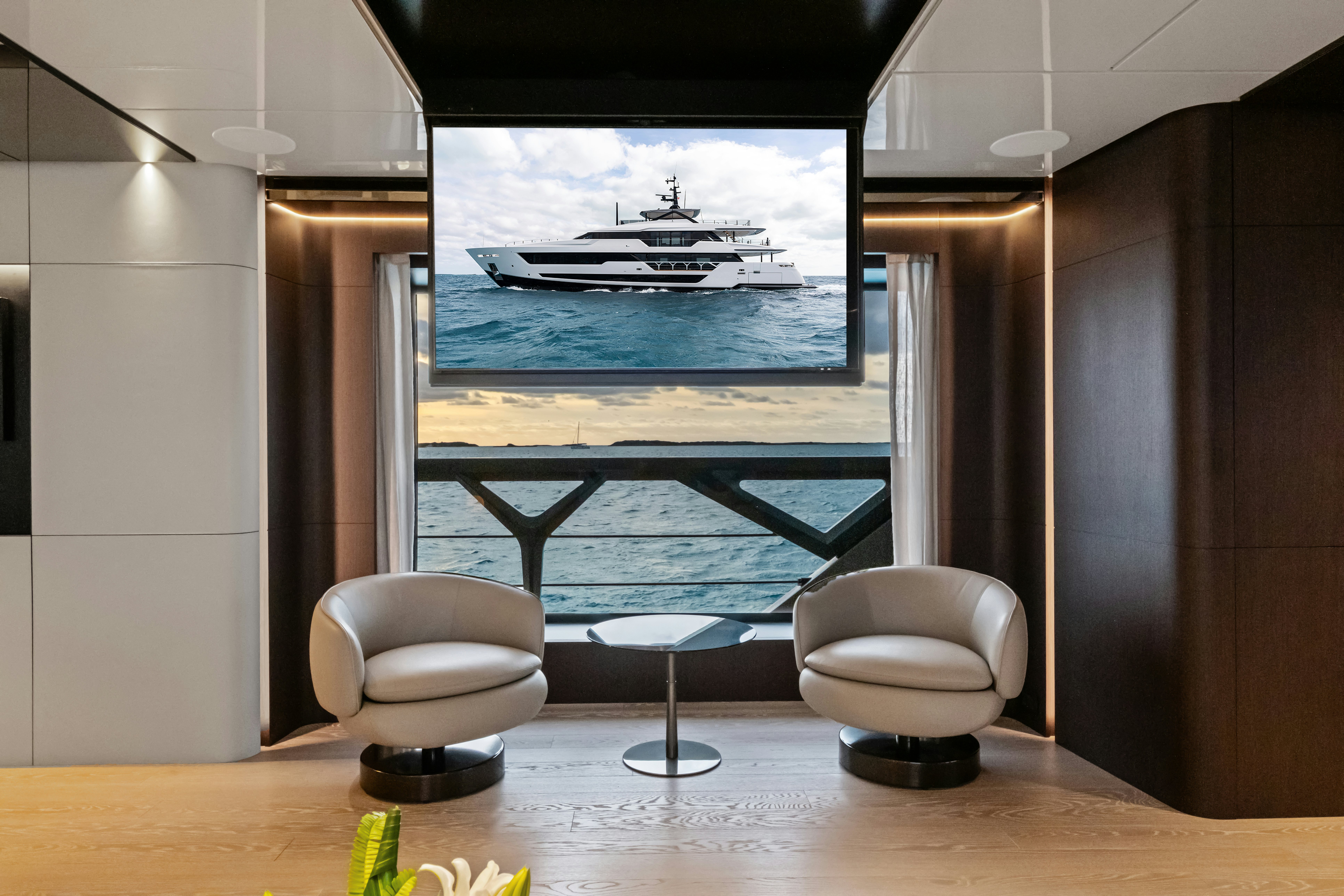 a room with a large window and a view of the ocean aboard CANOE CANOE Yacht for Charter