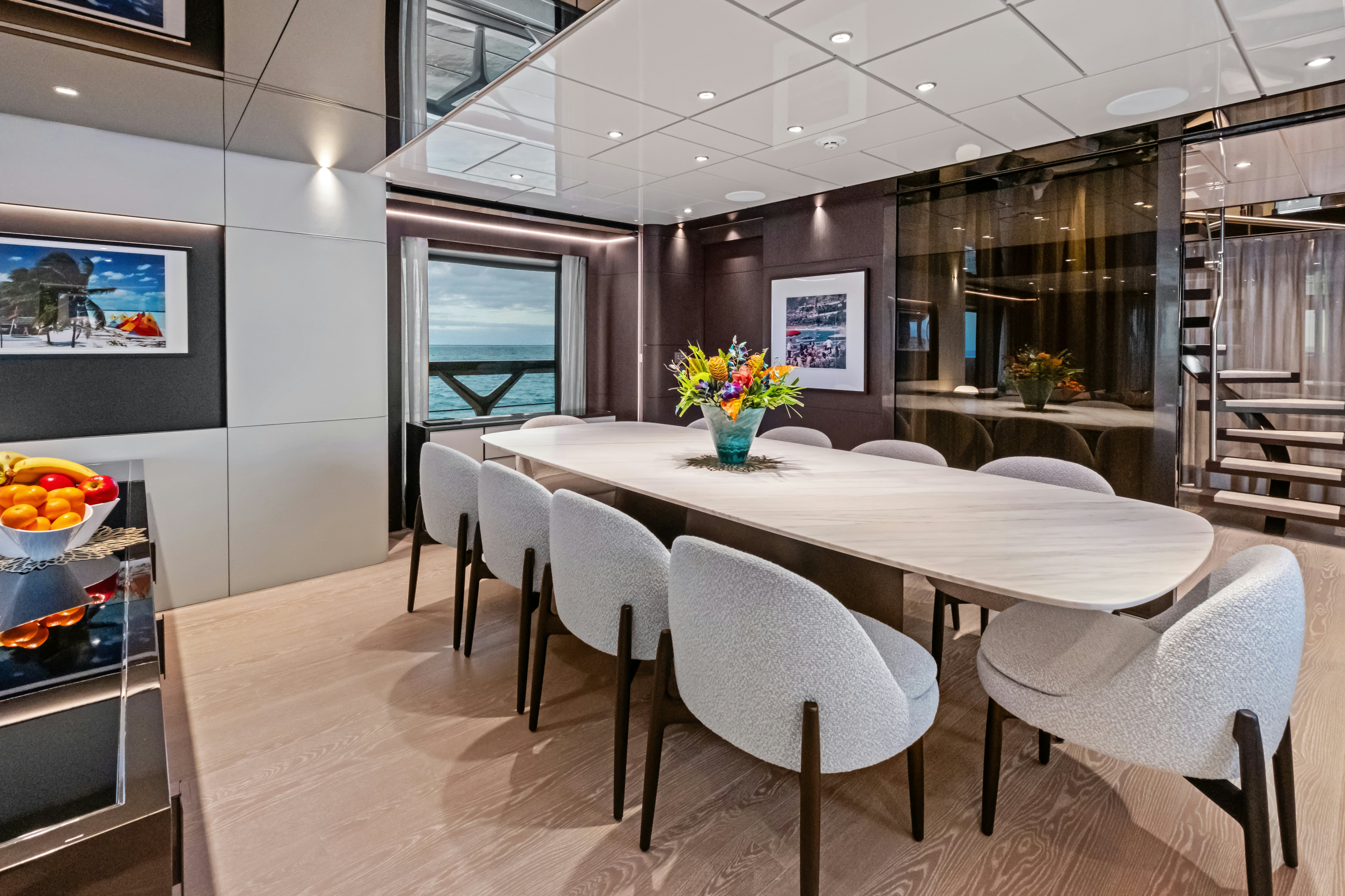 a dining room with a table aboard CANOE CANOE Yacht for Charter