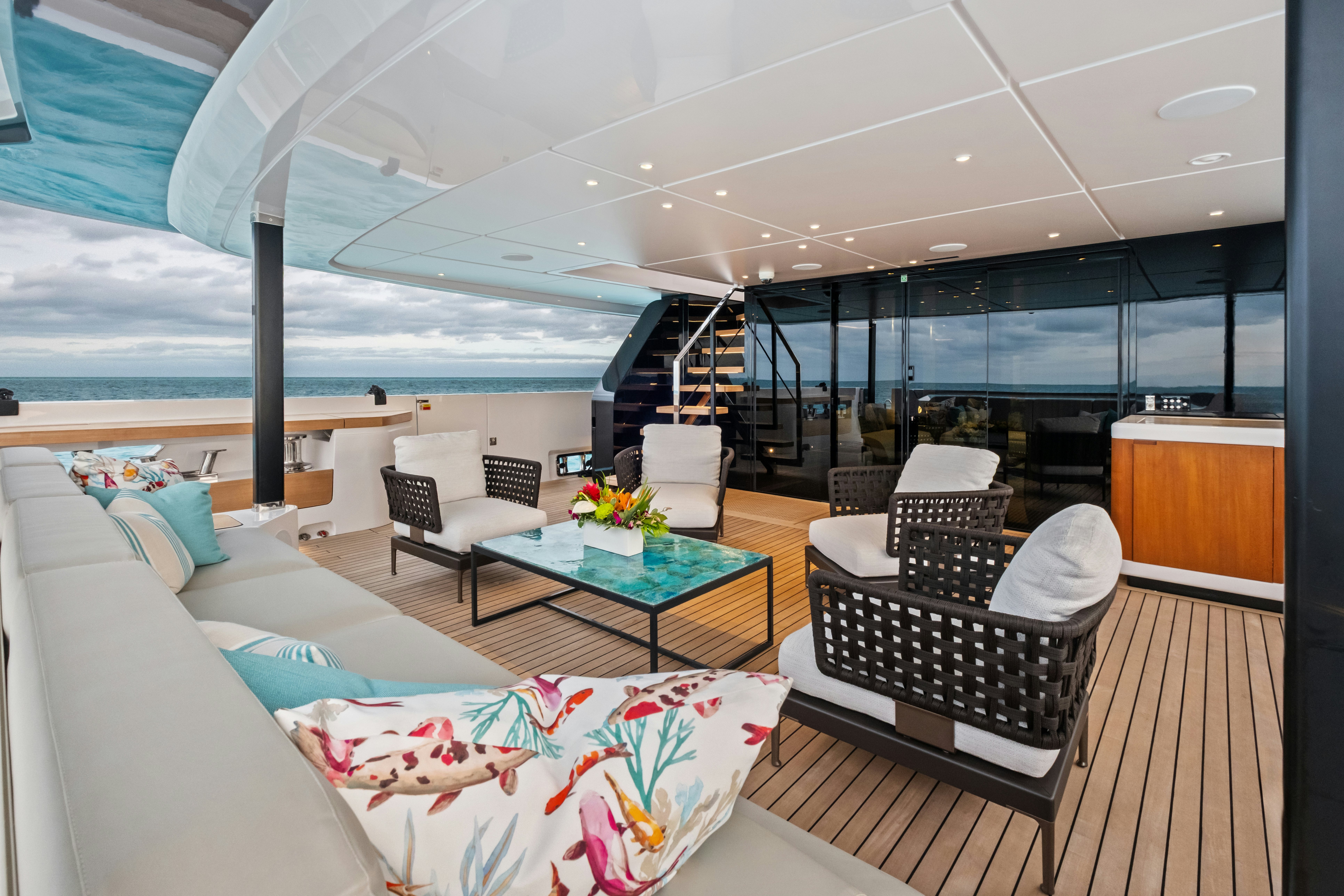 a room with a couch and a table and chairs aboard CANOE CANOE Yacht for Charter