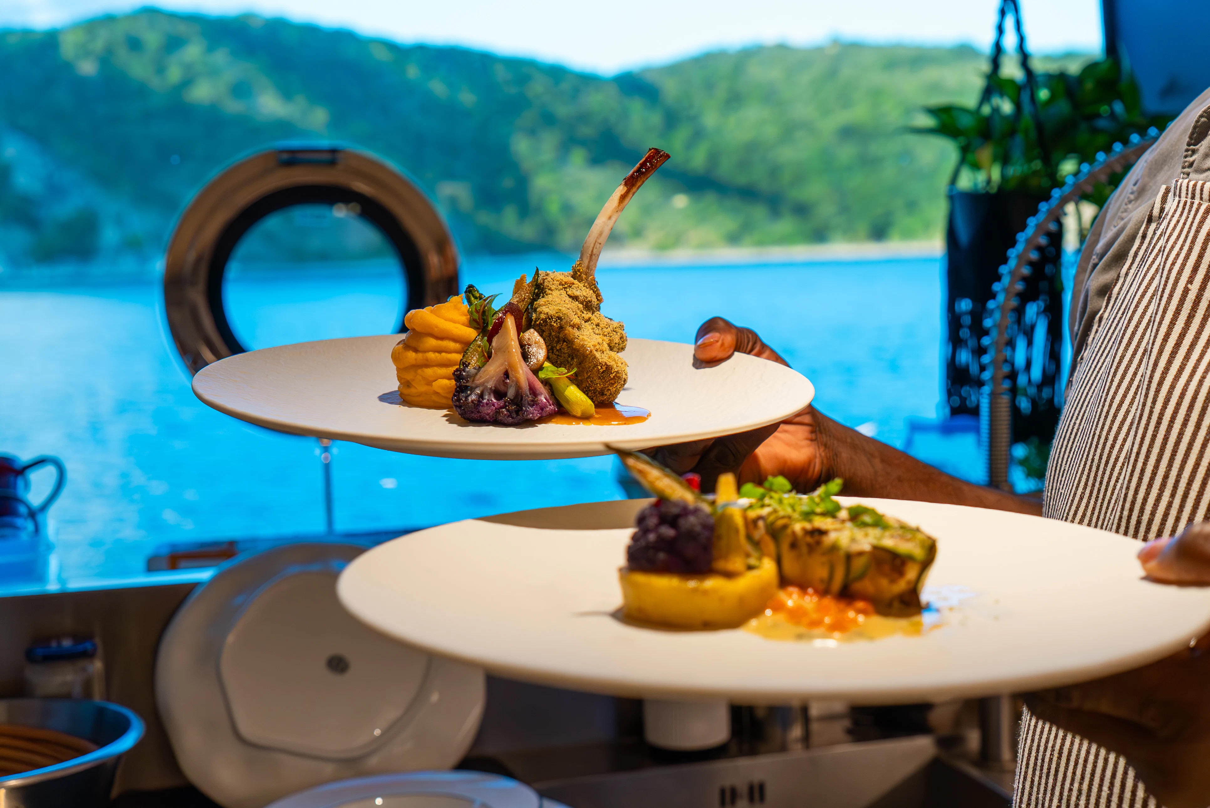 a plate of food on a table aboard CANOE CANOE Yacht for Charter