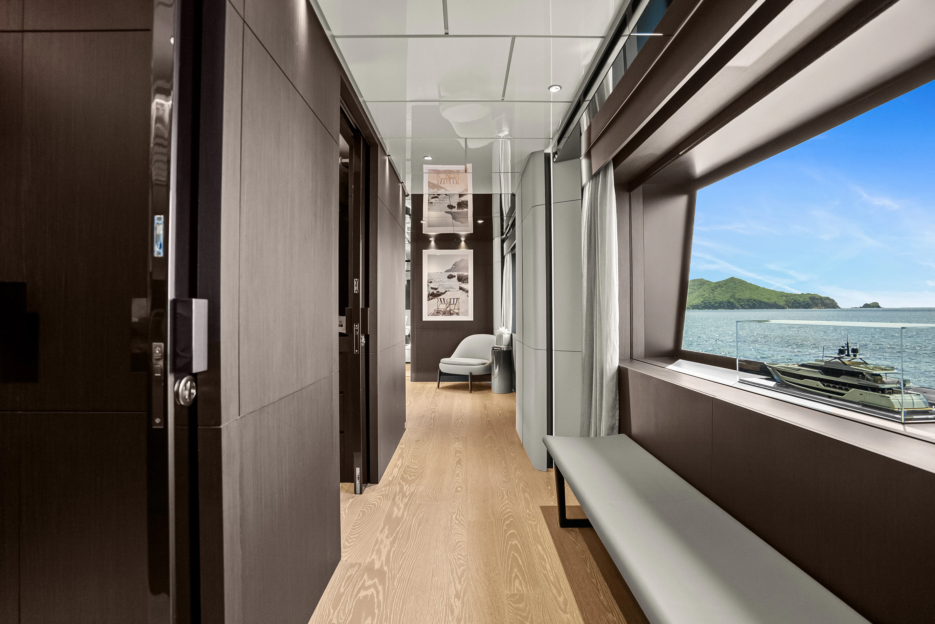 a long hallway with a view of the ocean aboard CANOE CANOE Yacht for Charter