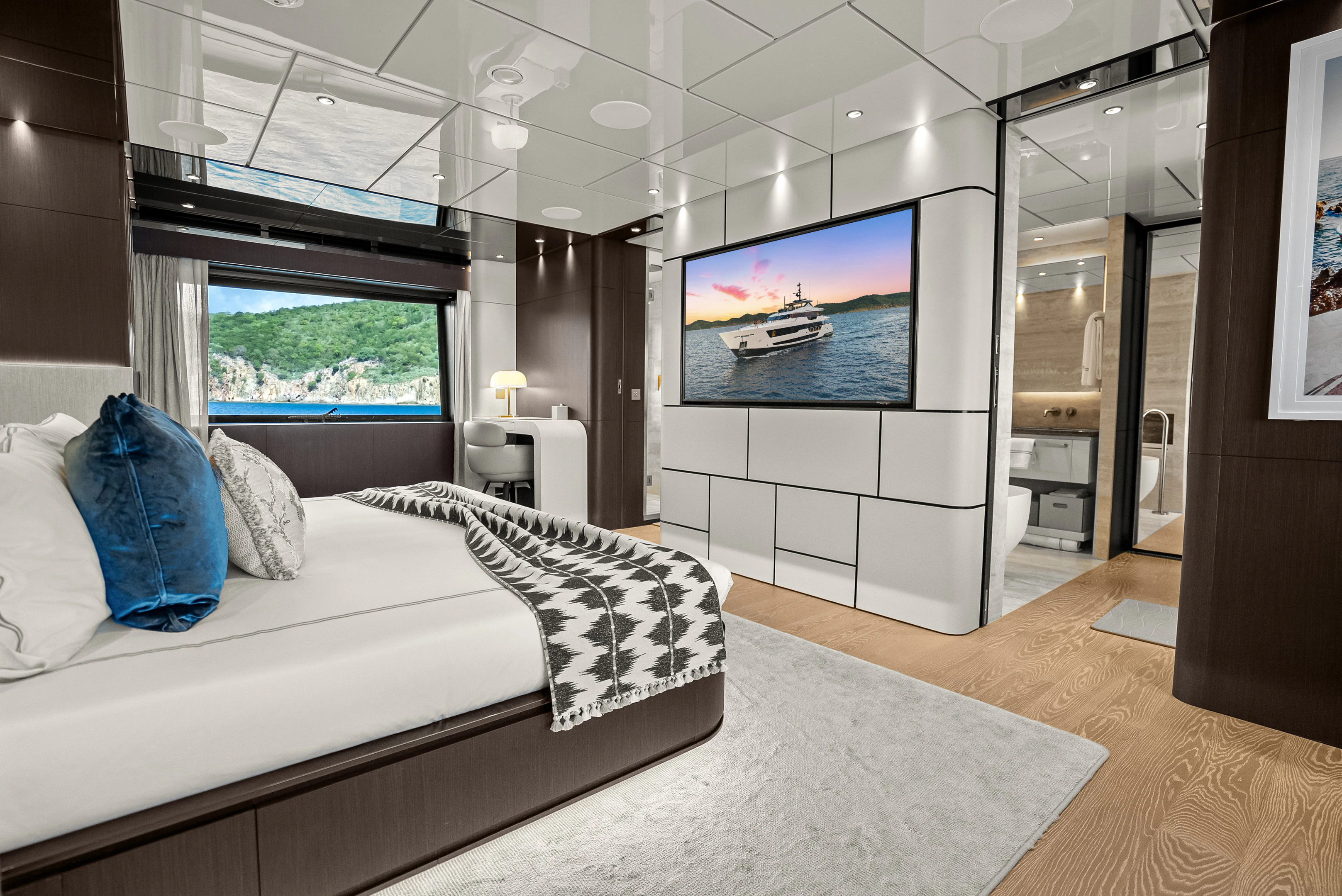 a room with a bed and a tv aboard CANOE CANOE Yacht for Charter
