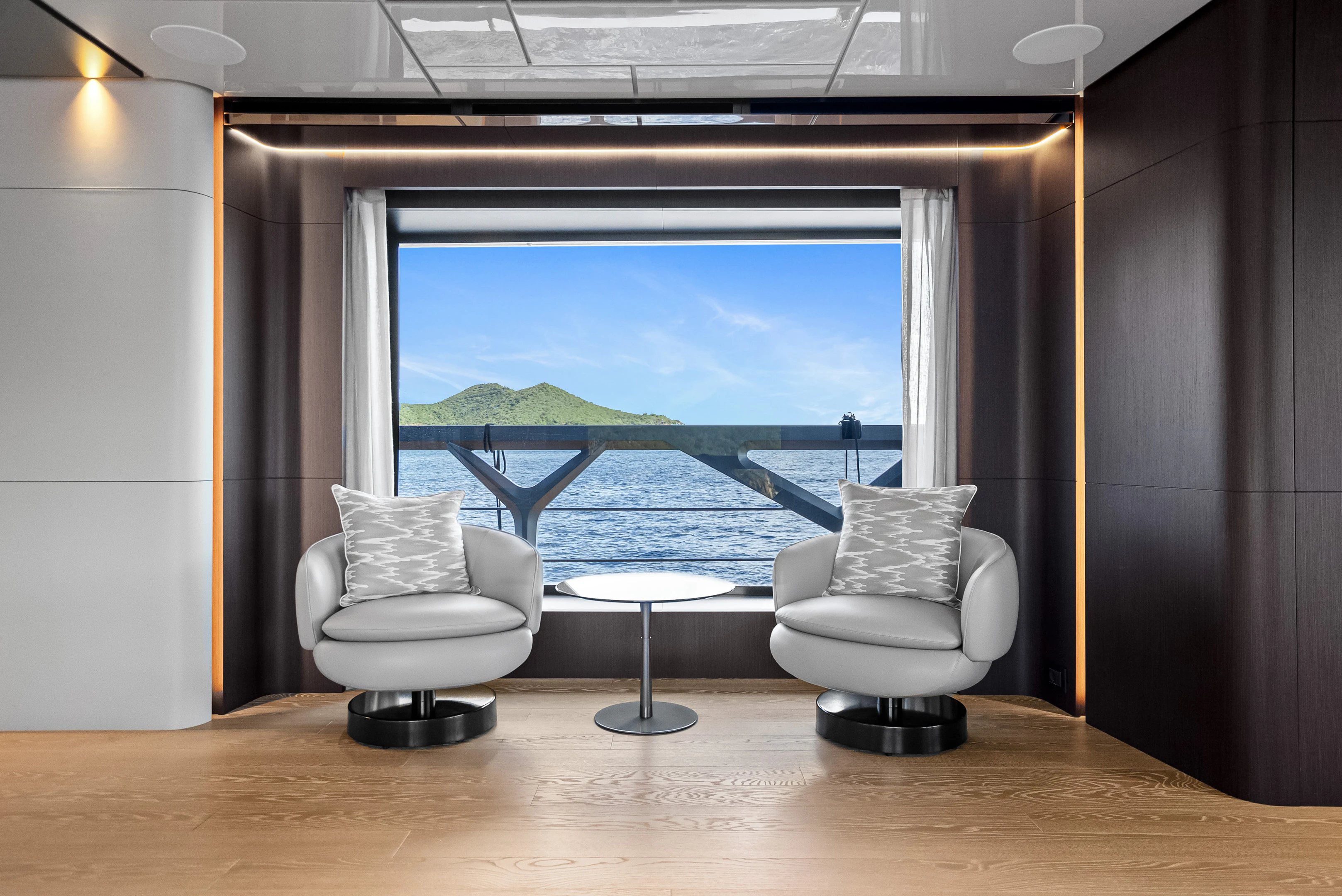 a room with a table and chairs aboard CANOE CANOE Yacht for Charter