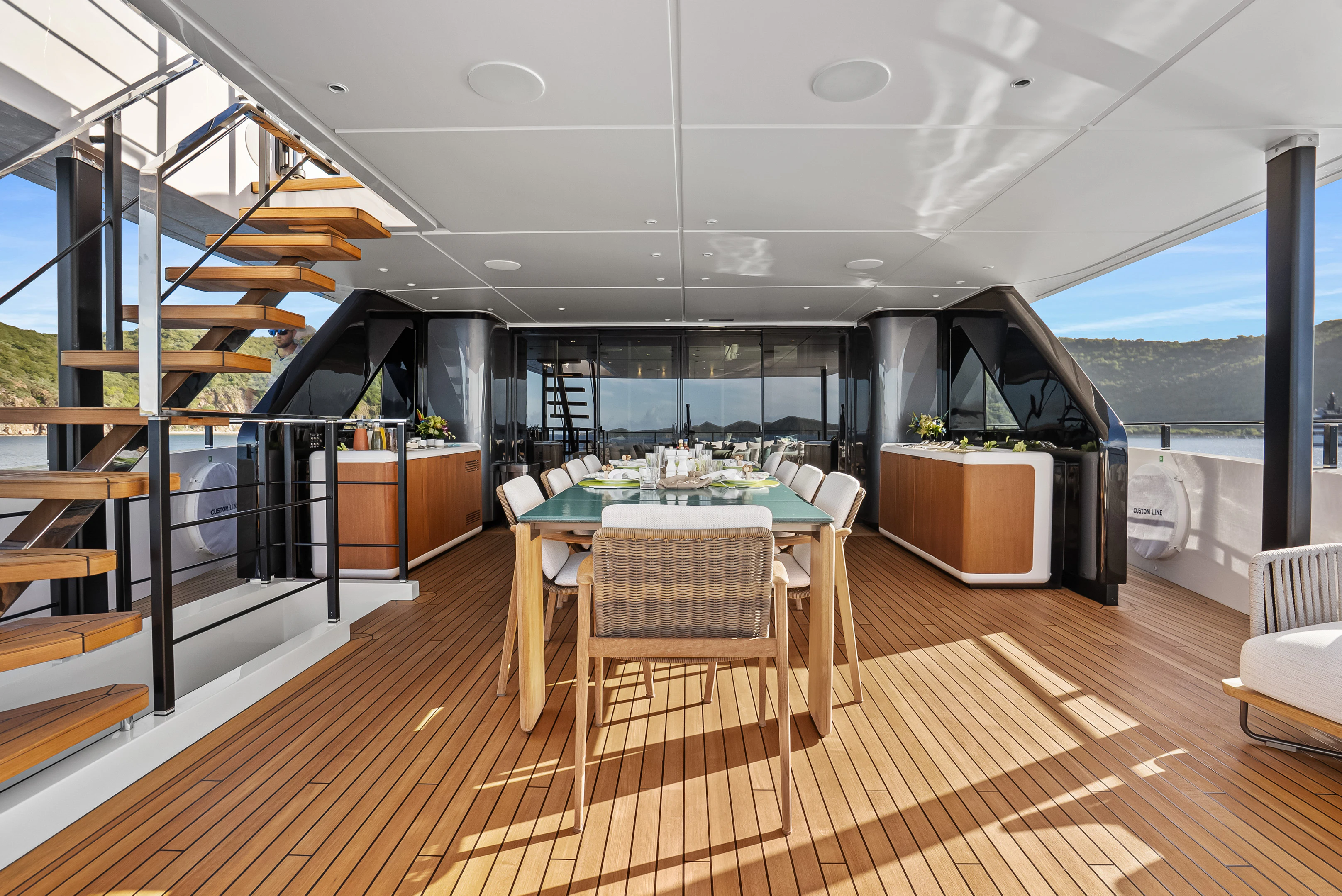 a room with a table and chairs aboard CANOE CANOE Yacht for Charter