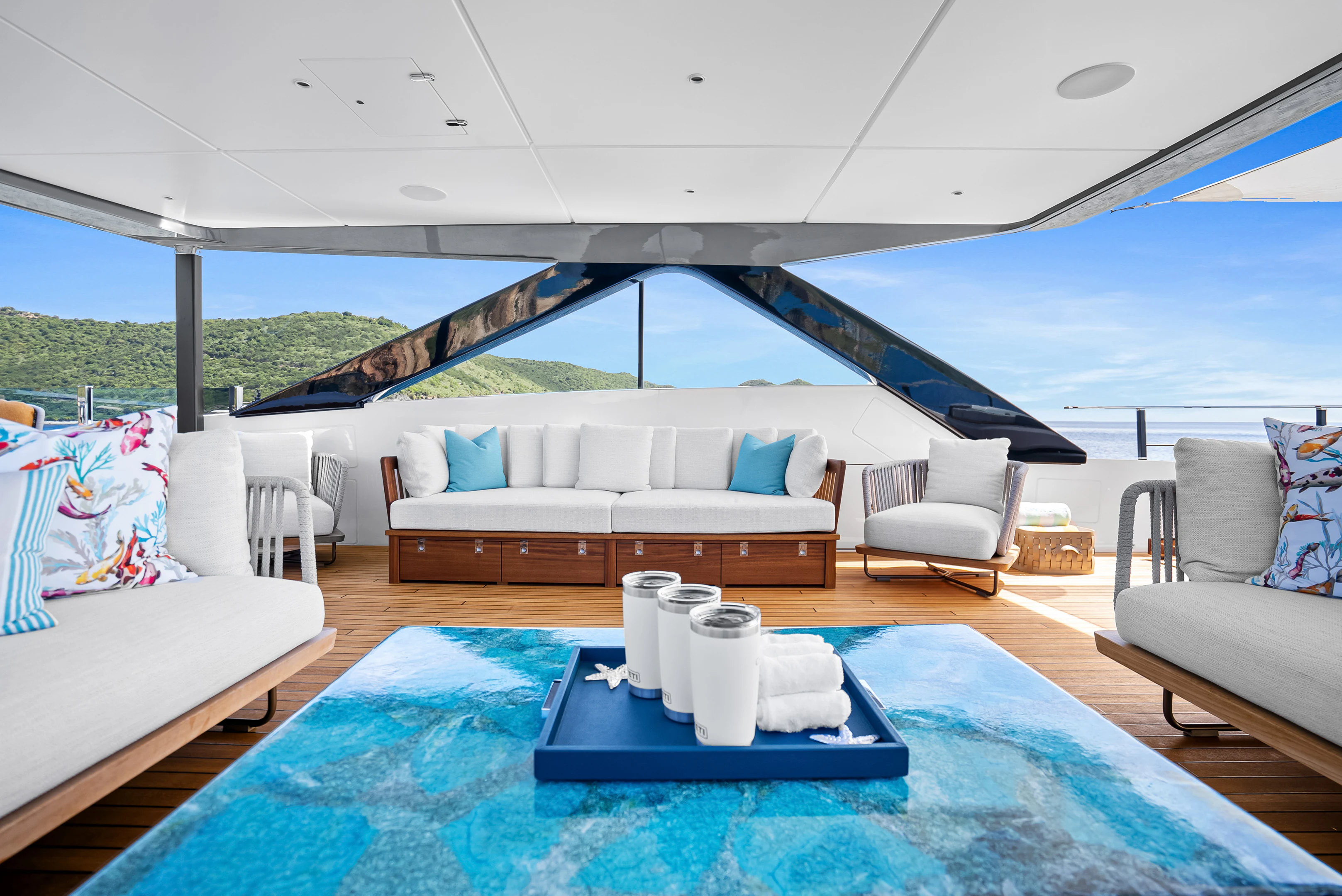 a large blue swimming pool aboard CANOE CANOE Yacht for Charter
