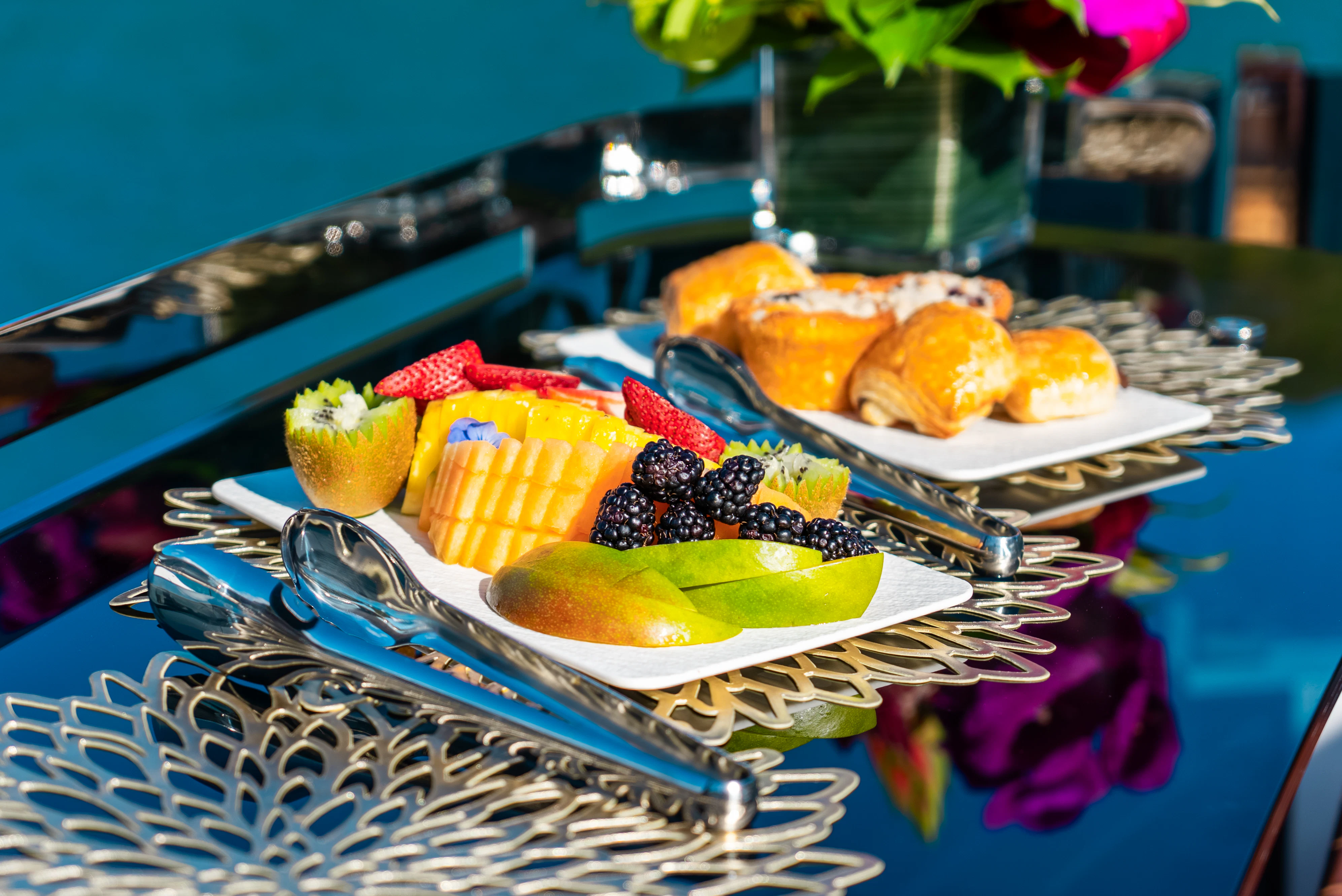 a couple of plates of fruit aboard CANOE CANOE Yacht for Charter