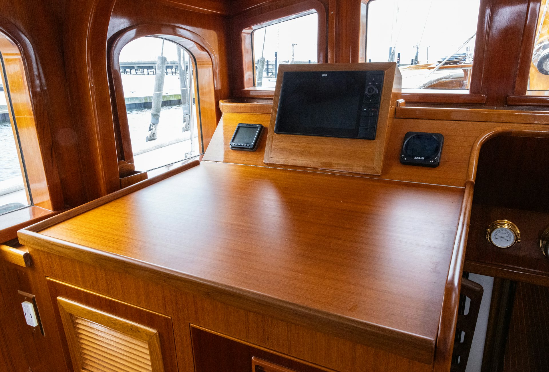 a tv on a table aboard HERMITAGE Yacht for Sale