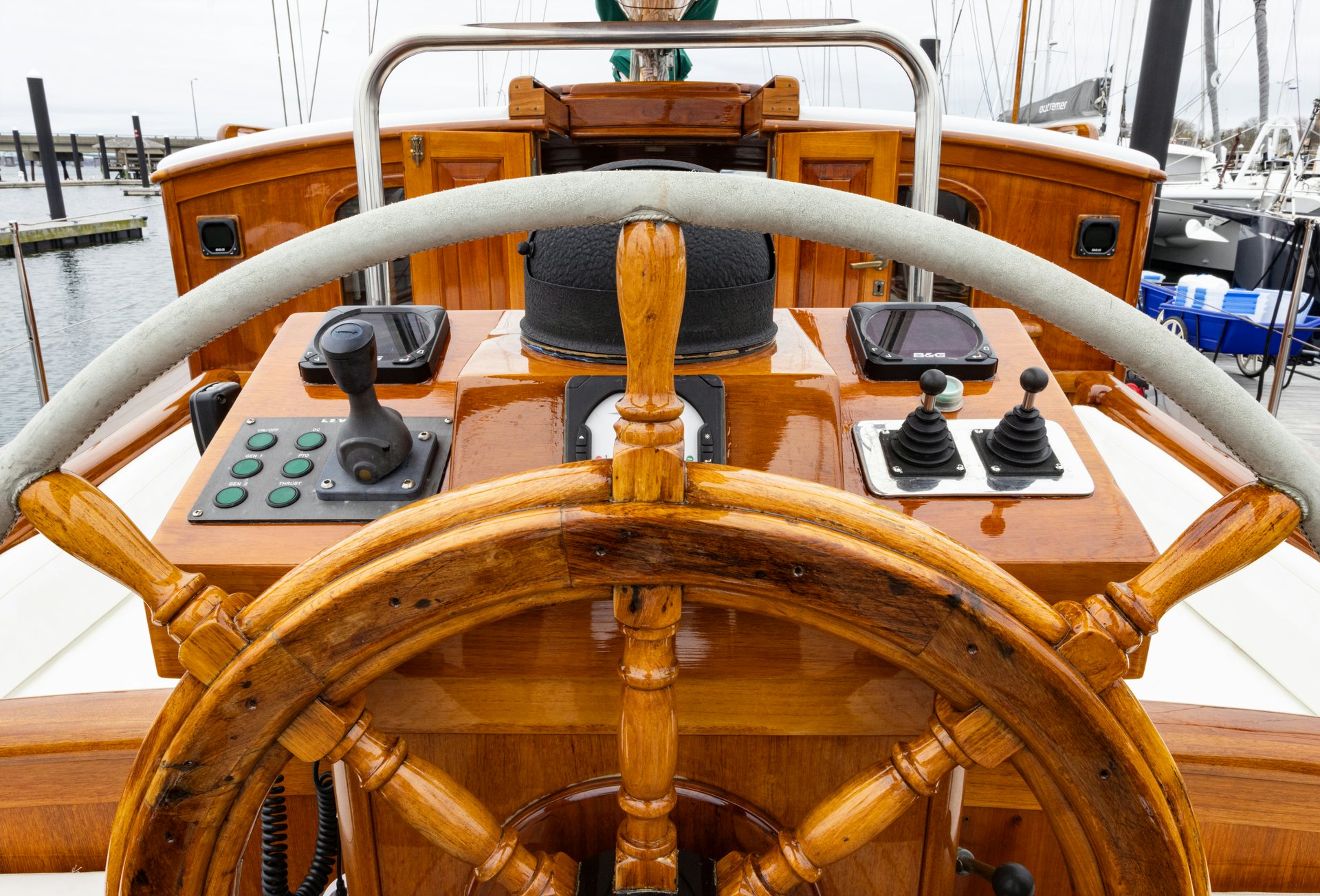 a large wooden steering wheel aboard HERMITAGE Yacht for Sale