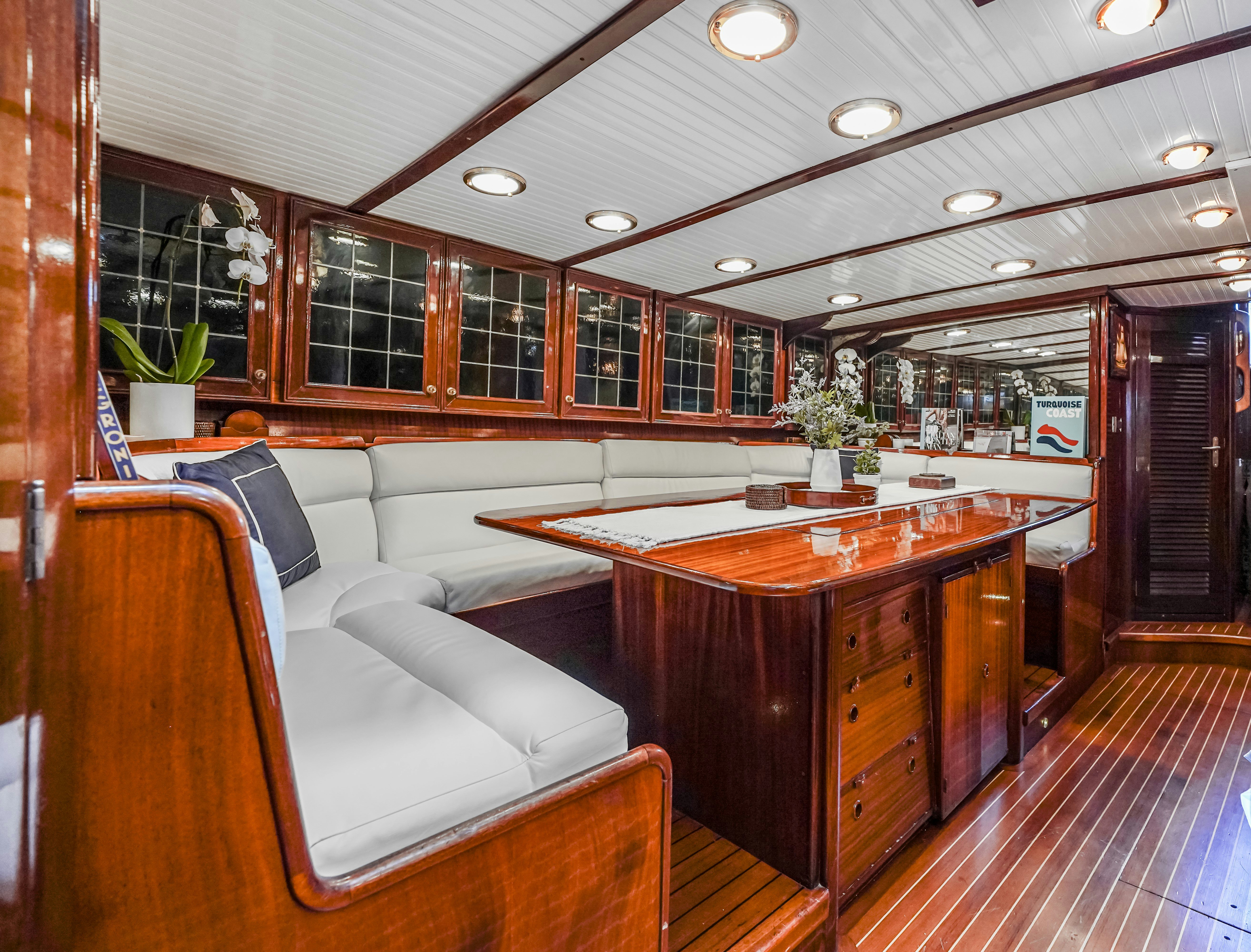 a large kitchen and living room aboard HERMITAGE Yacht for Sale