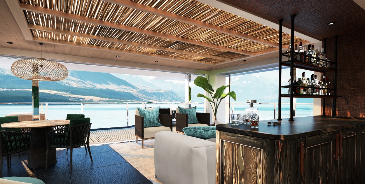 a room with a table chairs and a large window aboard KING BENJI Yacht for Sale