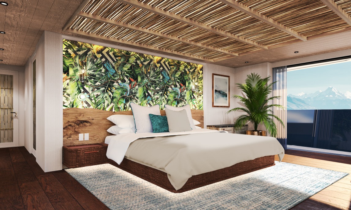 a large bed in a room aboard KING BENJI Yacht for Sale