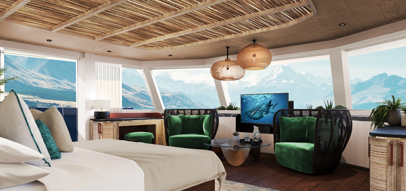 a room with a large window and a large television aboard KING BENJI Yacht for Sale