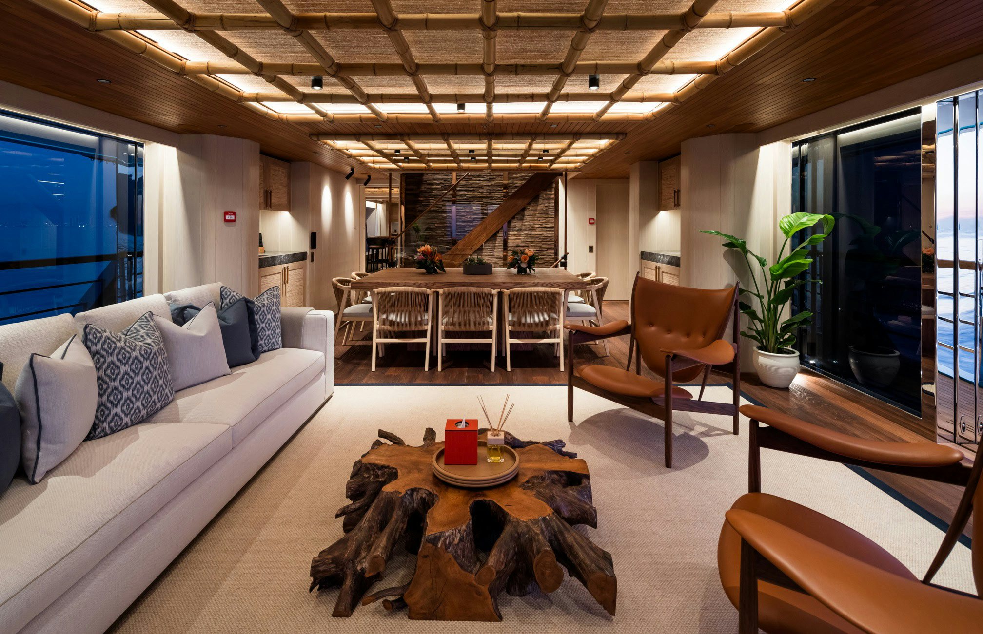 a living room with a couch and a table aboard KING BENJI Yacht for Sale