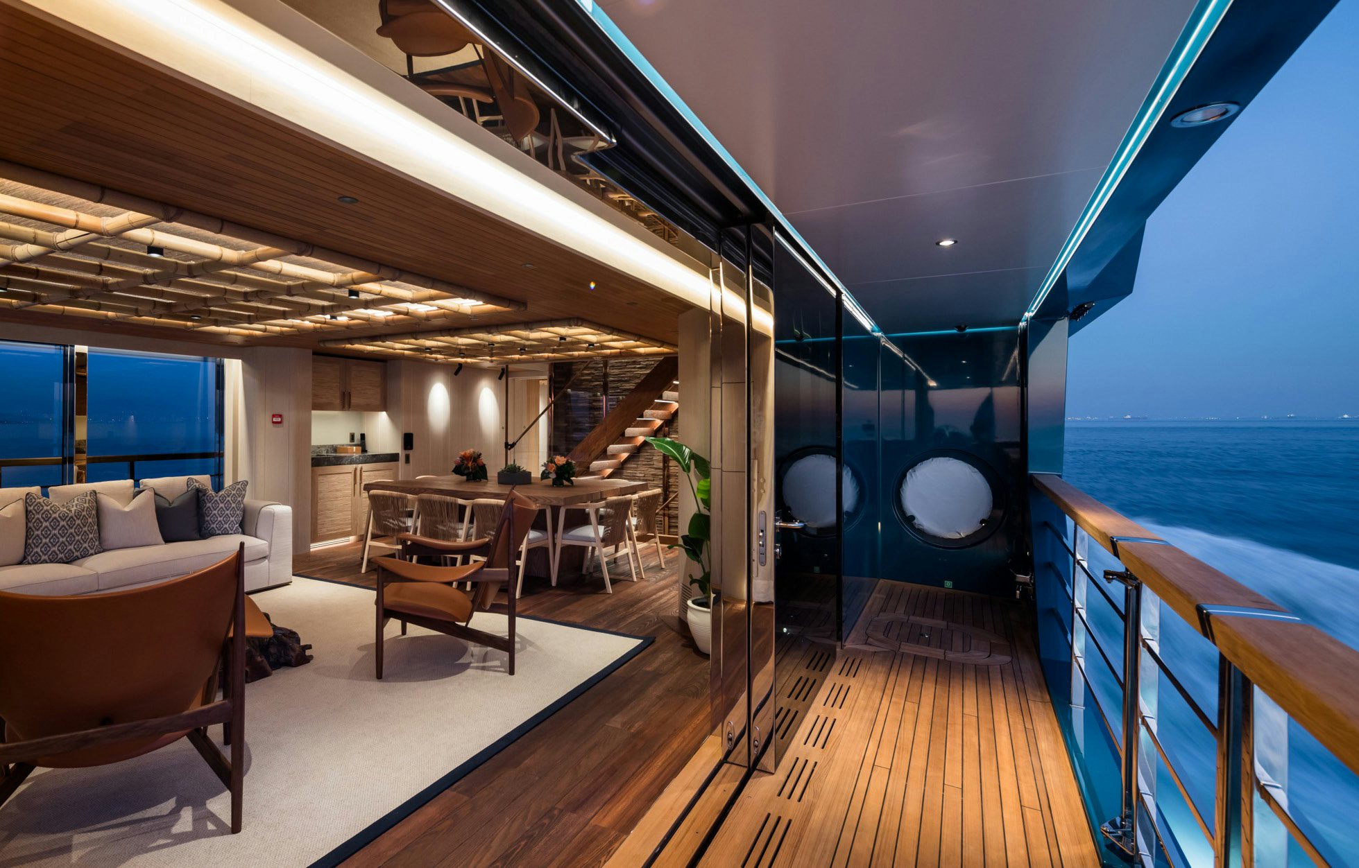 a room with a wood floor and a large pool aboard KING BENJI Yacht for Sale