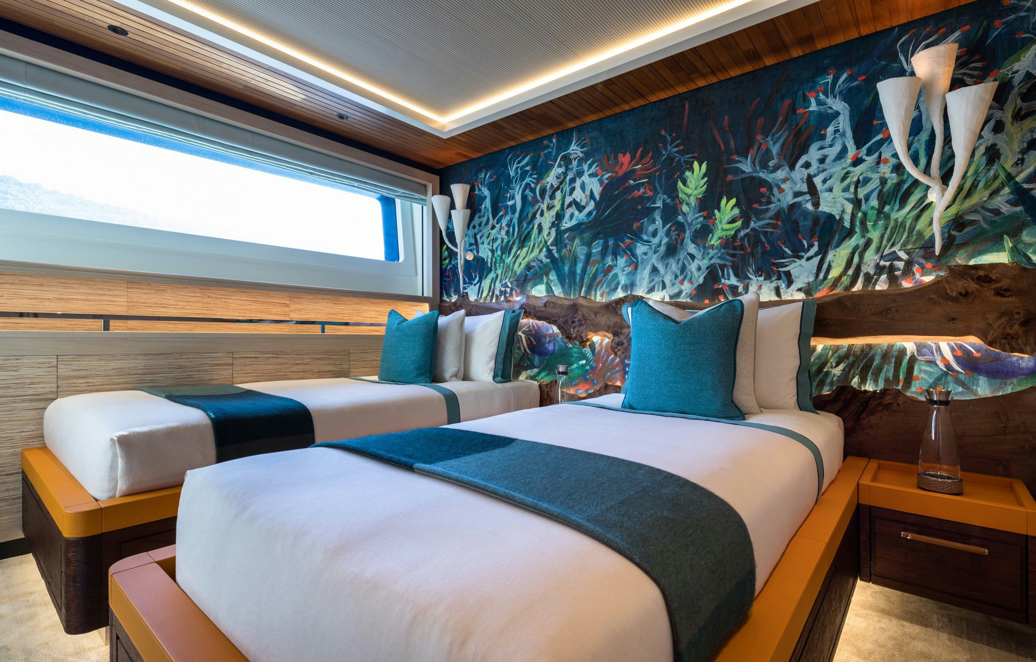 a room with a bed and a window aboard KING BENJI Yacht for Sale