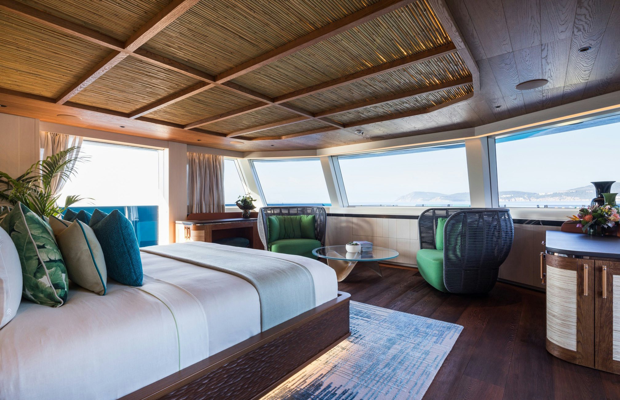a large bed in a room aboard KING BENJI Yacht for Sale