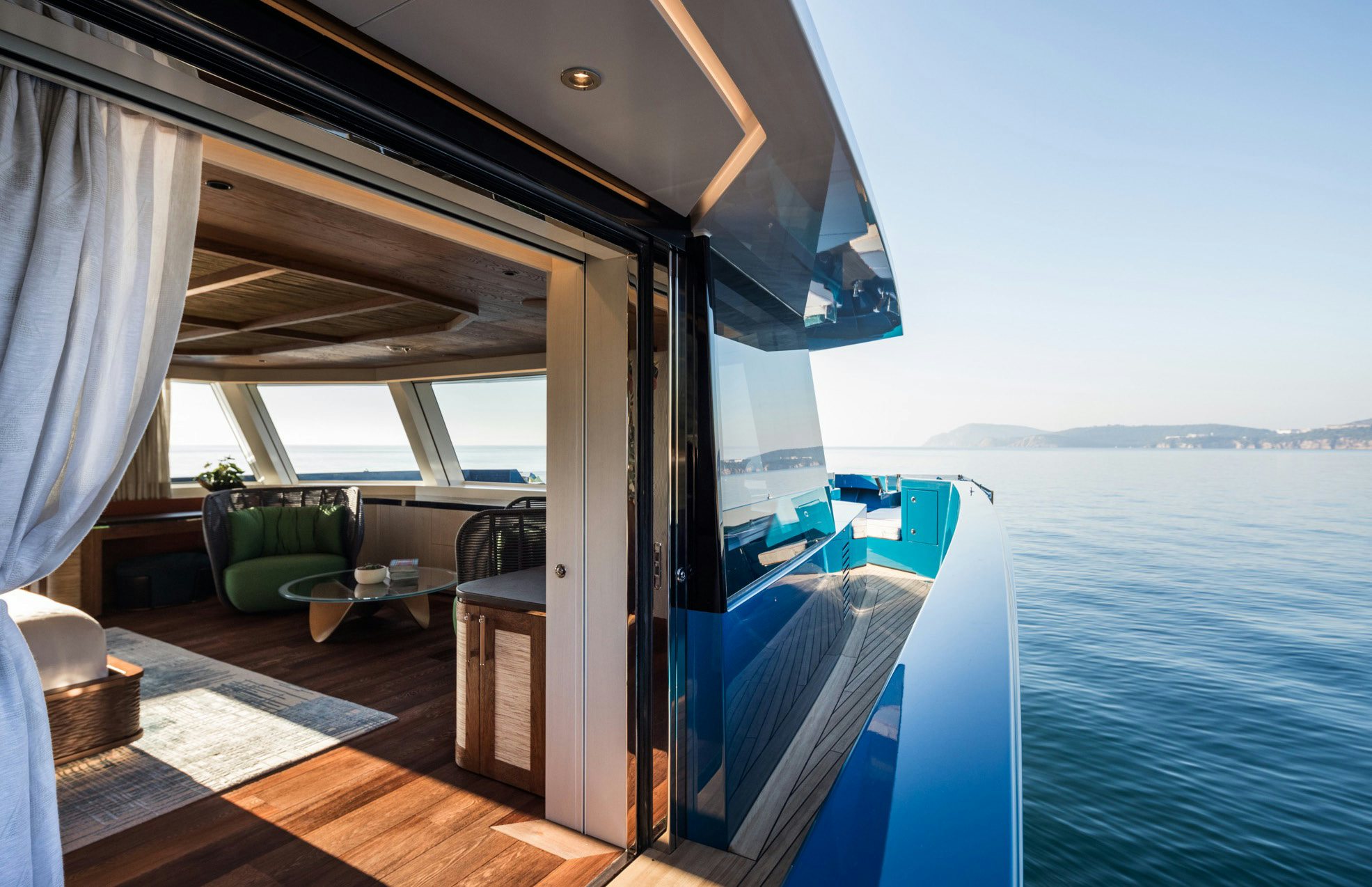 a large boat on the water aboard KING BENJI Yacht for Sale