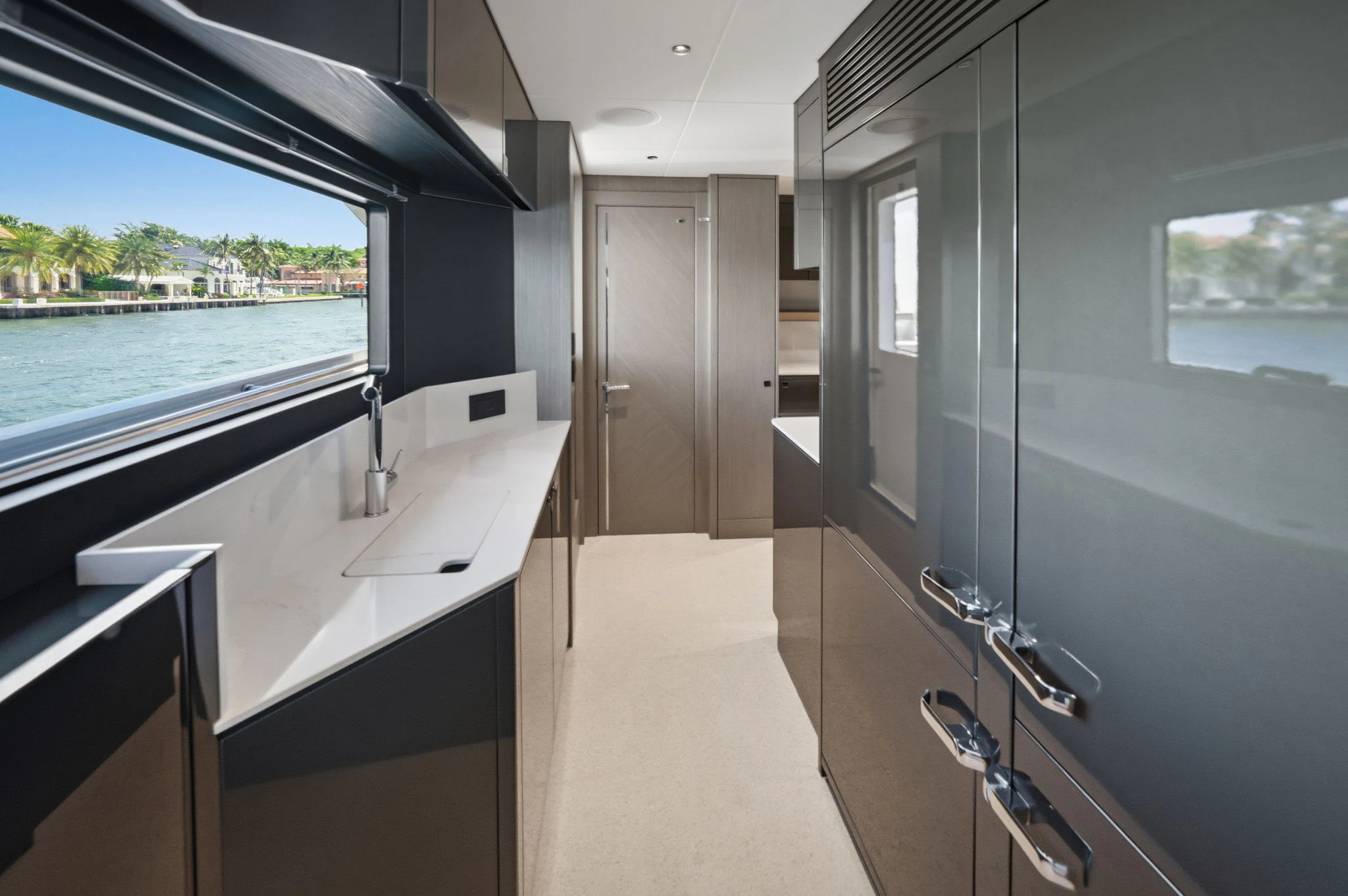 a room with a sink and a window aboard PURA VIDA Yacht for Sale