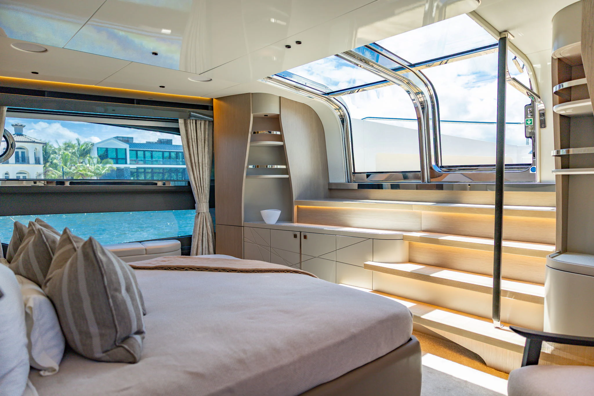 a bed in a room aboard PURA VIDA Yacht for Sale